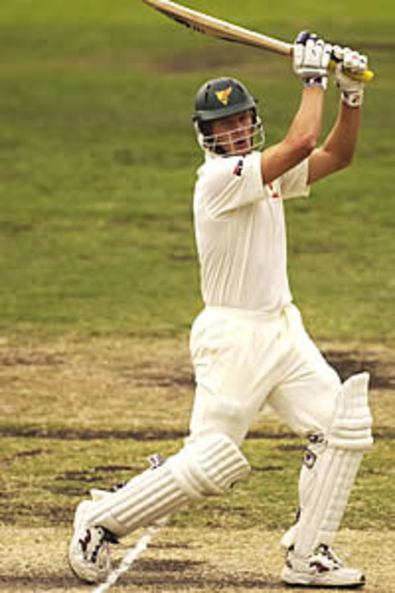 HOBART - NOVEMBER 25: Shane Watson of the Tigers hits one to the boundary during the fourth day of the Pura Cup match between the Tasmanian Tigers and New South Wales Blues played at the Bellerive Oval, Hobart, Australia on November 25, 2002.