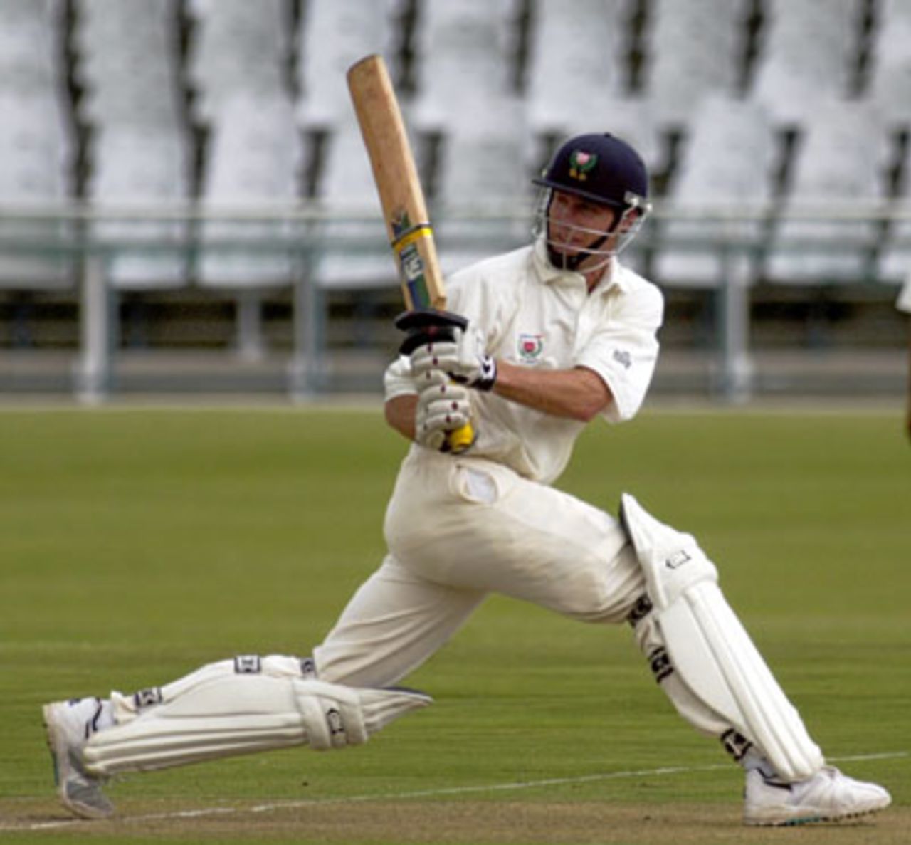 Neil Johnson sweeps a ball against North West at Newlands on Friday
