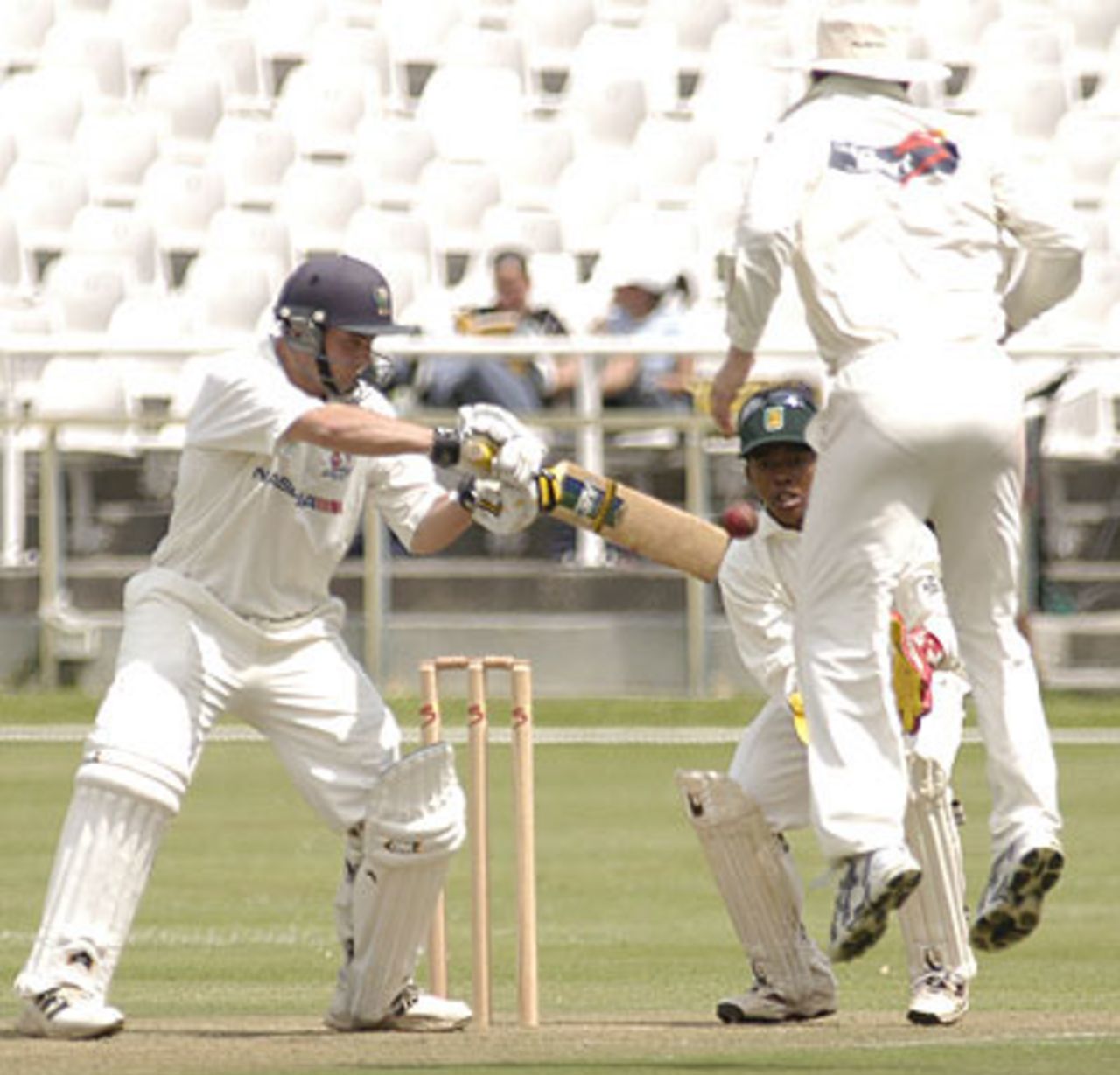 Derrin Bassage cuts a ball against North West at Newlands on Friday
