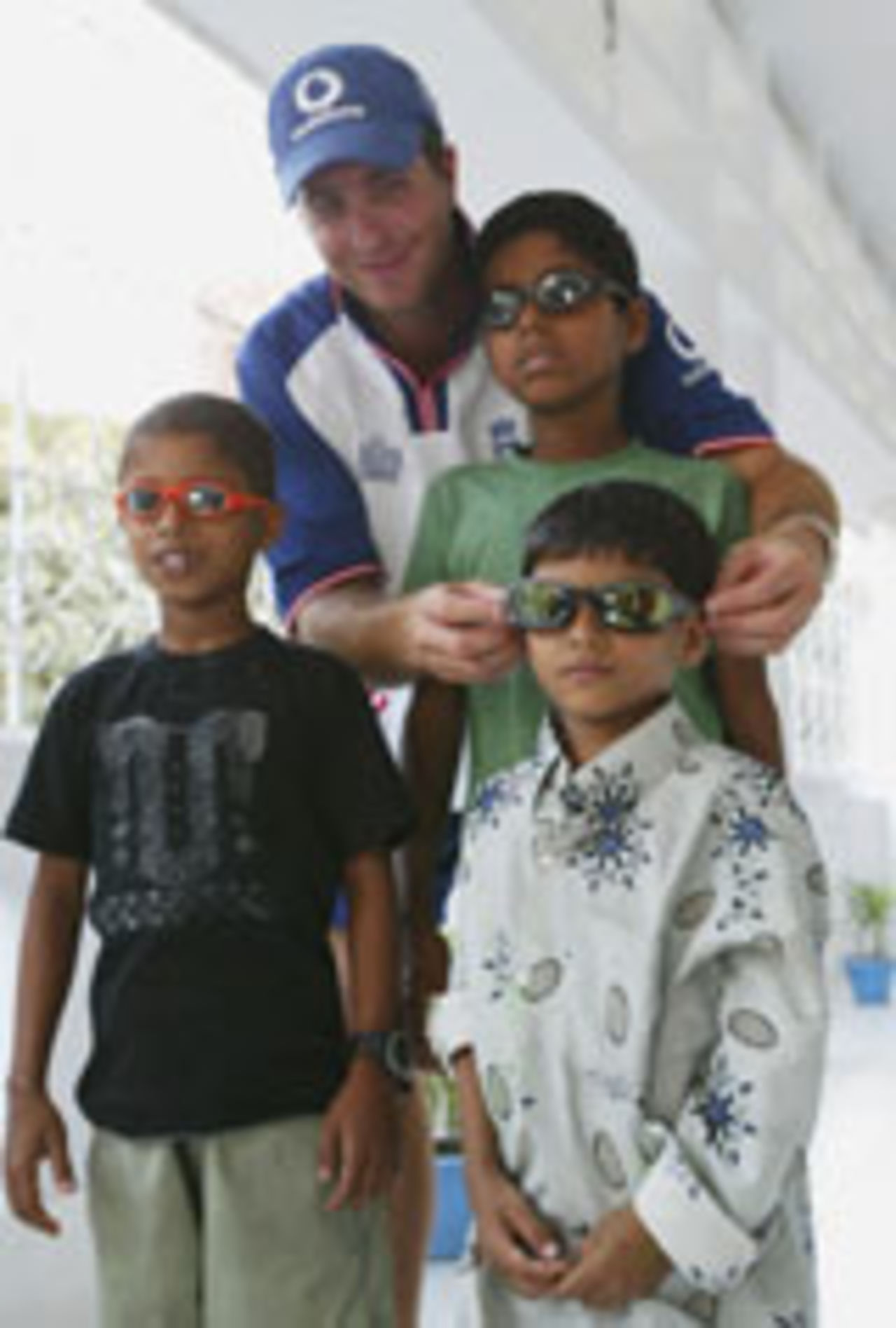 Michael Vaughan with Bangladeshi children, Dhaka, November 3, 2003