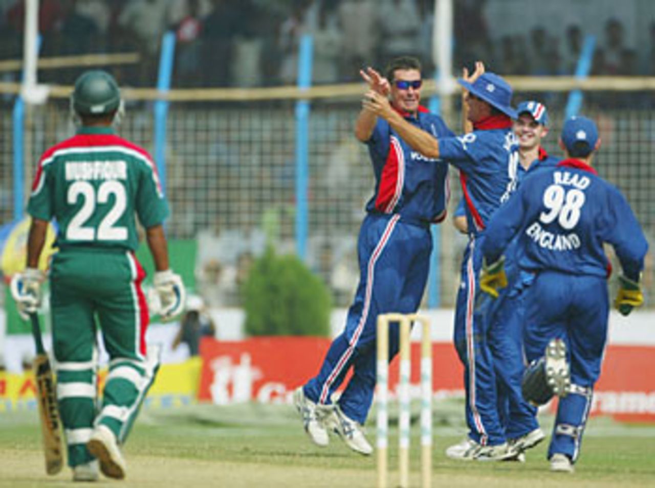 Ashley Giles celebrates taking a sharp return catch to dismiss Mushfiqur Rahman, Bangladesh v England, 1st ODI, Chittagong, November 7, 2003