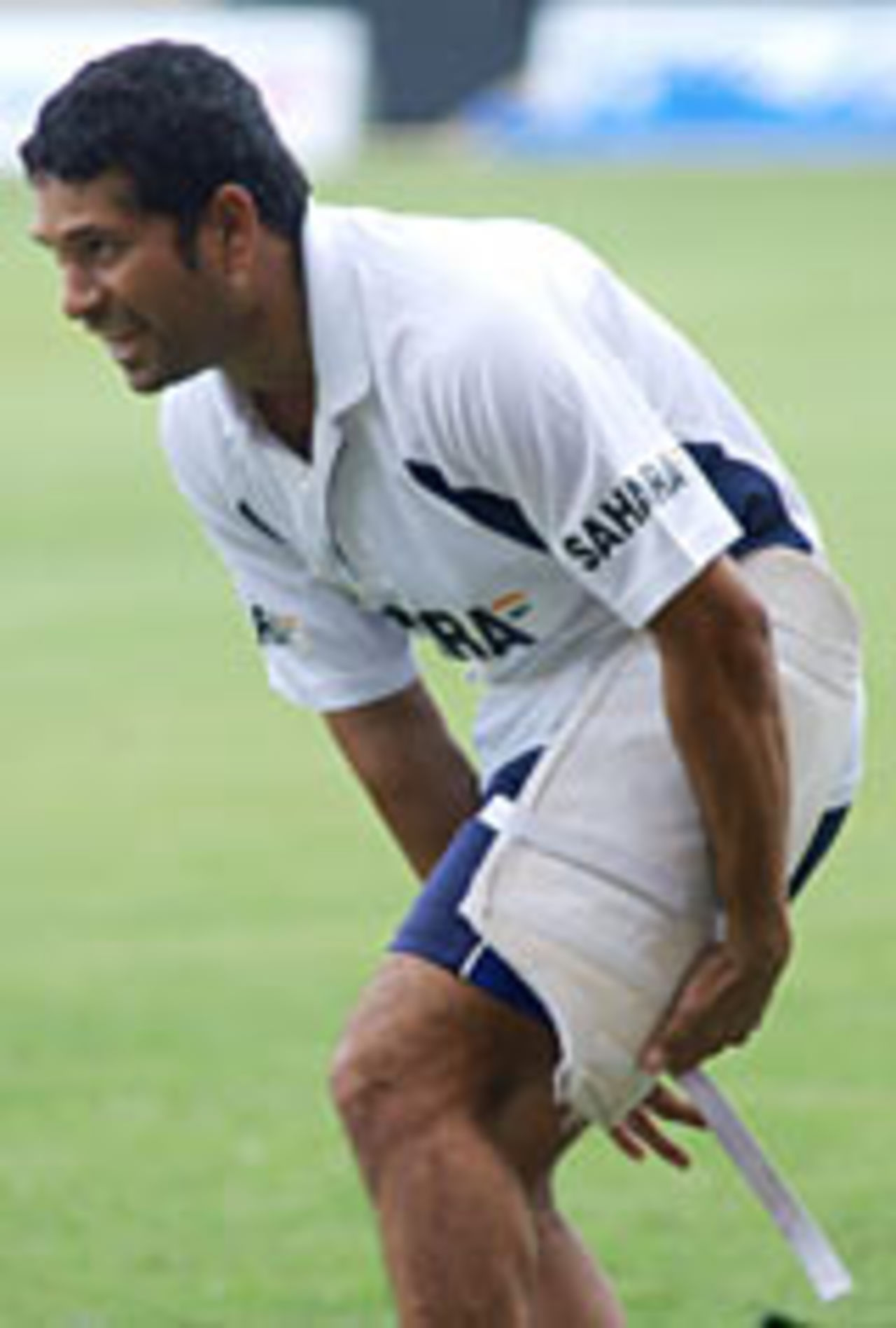Sachin Tendulkar pads up during a practice session at Bangalore, November 10, 2003
