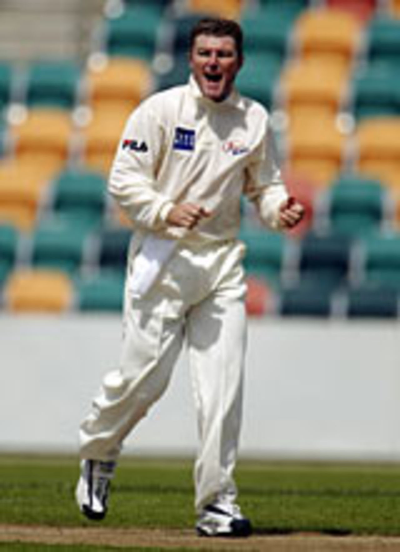 Stuart MacGill roars his delight on taking a wicket on his way to 5 for 79, Tasmania v NSW, Pura Cup, Hobart, November 14, 2003
