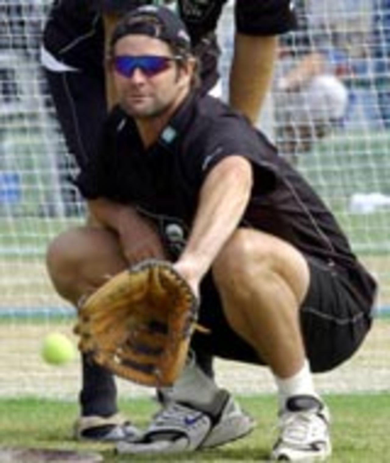 Chris Cairns plays baseball during practice at Hyderabad, TVS Cup 2003