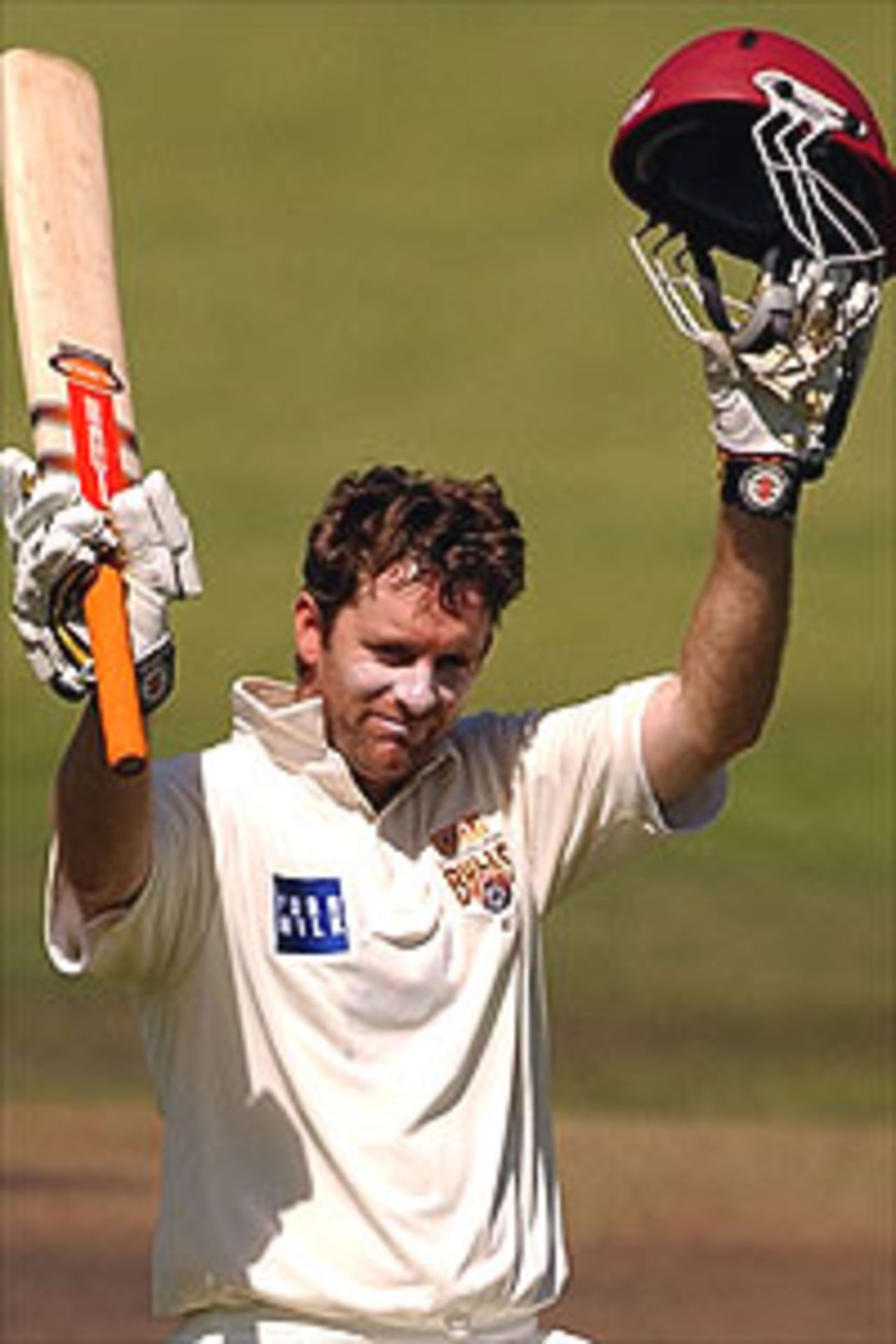 Martin Love of Queensland celebrates his double century during the Pura Cup Cricket match between the Victorian Bushrangers and Queensland Bulls at the Junction Oval November 13, 2003 in Melbourne, Australia.