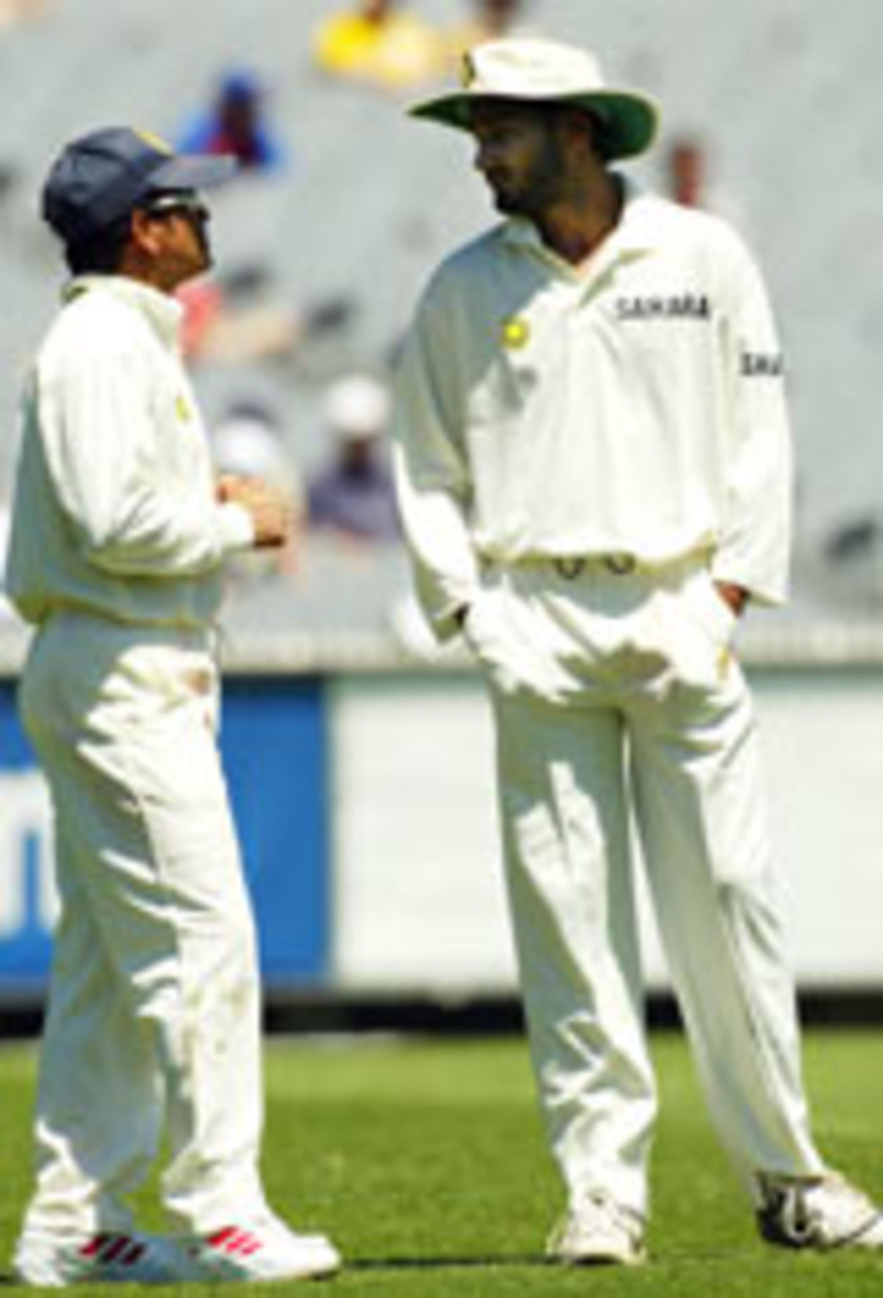 Sachin Tendulkar and Harbhajan Singh consulting as Victoria pile on the runs, Victoria v Indians, Tour match, Melbourne, 3rd day, November 27, 2003
