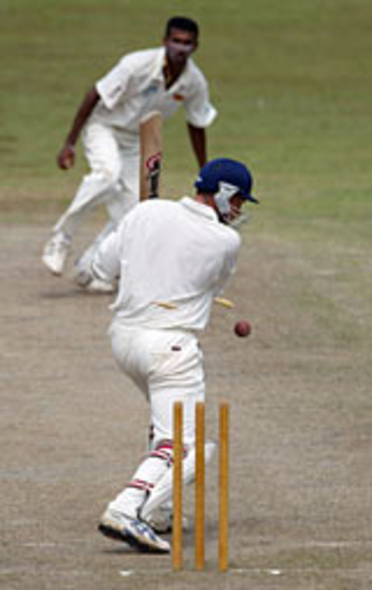 Ashley Giles is bowled by Chamila Gamage on the final day of England's warm-up match at Colombo CC, Sri Lanka Cricket President's XI v England XI, Colombo, November 28, 2003