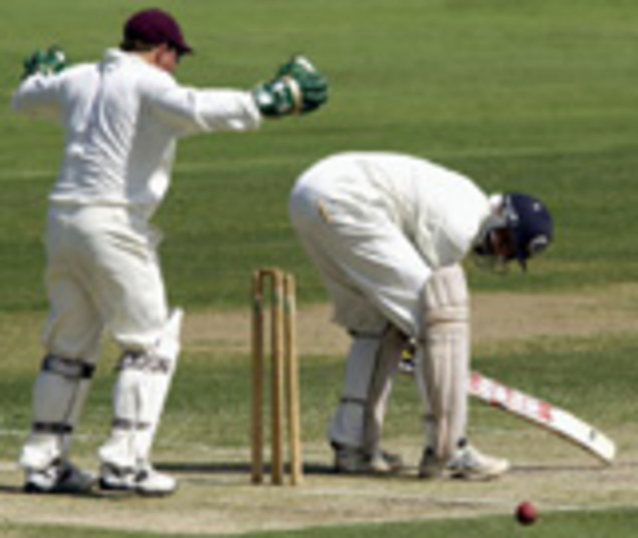 VVS Laxman is bowled by Chris Simpson, Queensland Academy of Sport v Indians, Allan Border Field, Brisbane, November 30, 2003