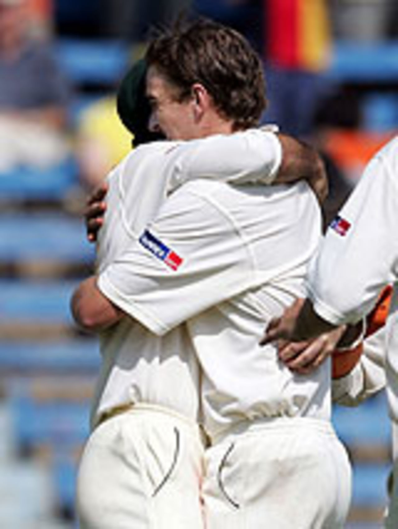 Nathan Hauritz hugs Ricky Ponting after picking up his first Test wicket, 2nd day, India v Australia, 4th Test, Mumbai, November 4, 2004