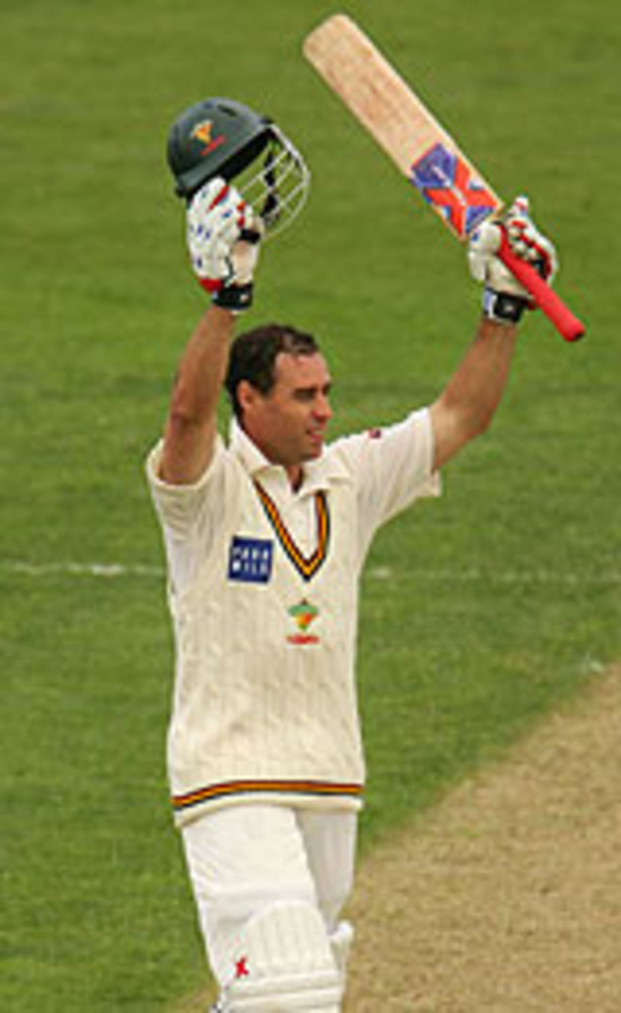 Michael Bevan acknowledges applause for his century, Tasmania v South Australia, Pura Cup, Hobart, 1st day, November 16, 2004