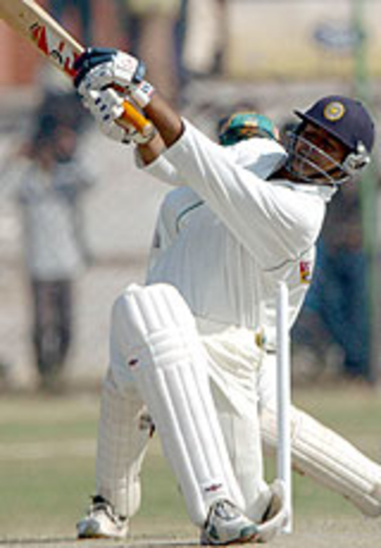 Dinesh Mongia smashes one away on his way to 148, Indian Board President's XI v South Africans, 3rd day, Jaipur, November 16, 2004