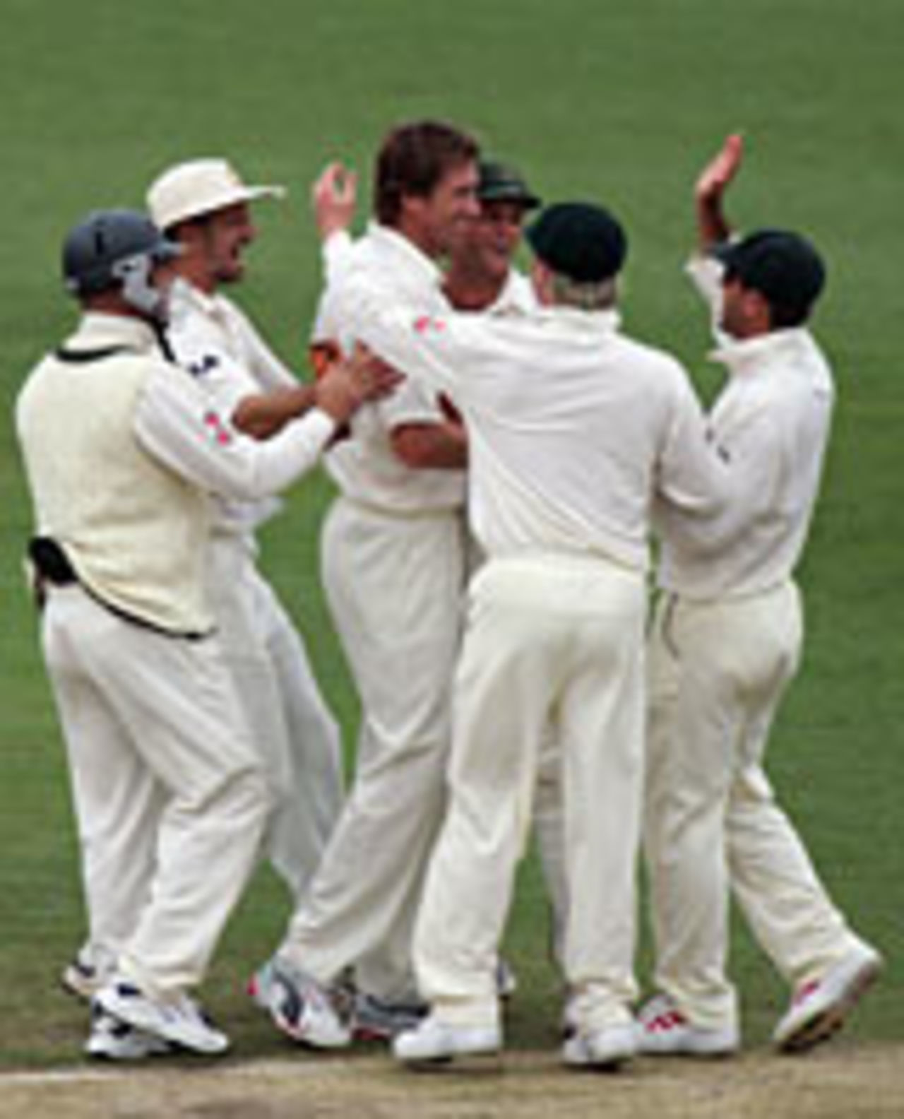 Glenn McGrath celebrates the first of his three pre-lunch wickets, Australia v New Zealand, 1st Test, Brisbane, November 21, 2004