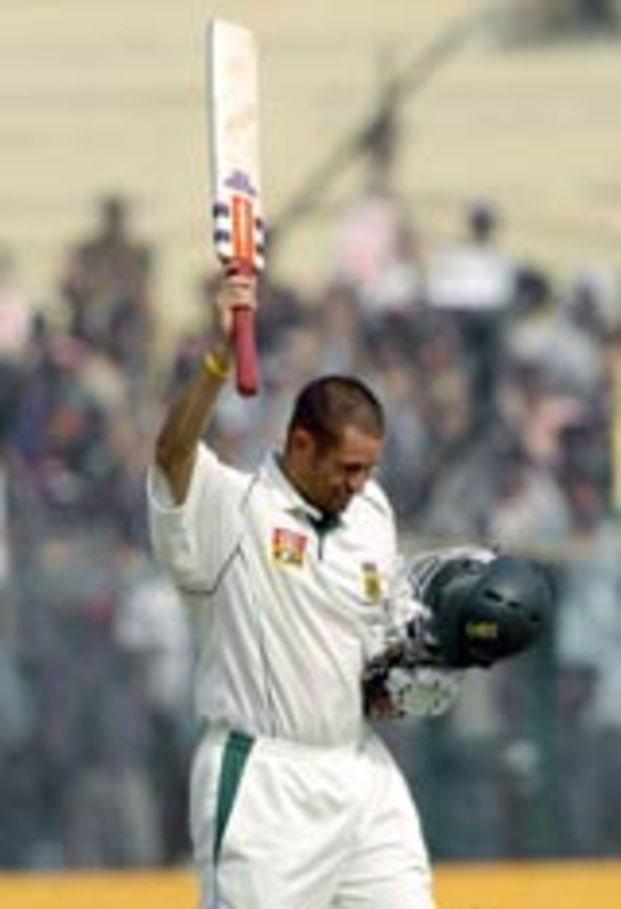 Andrew Hall celebrates his century, 2nd day, 1st Test, Kanpur, India v South Africa, November 21 2004