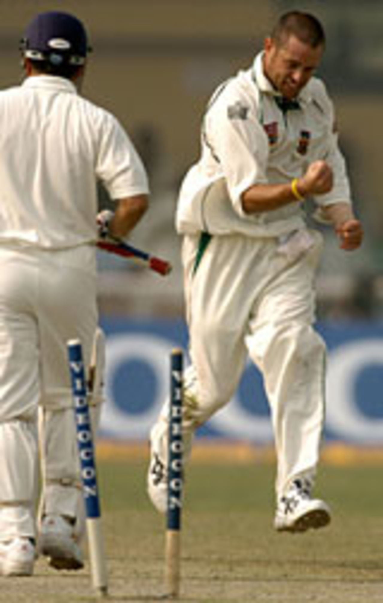 Andrew Hall celebrates Sachin Tendulkar's dismissal, India v South Africa, 1st Test, 4th day, Kanpur, November 23 2004