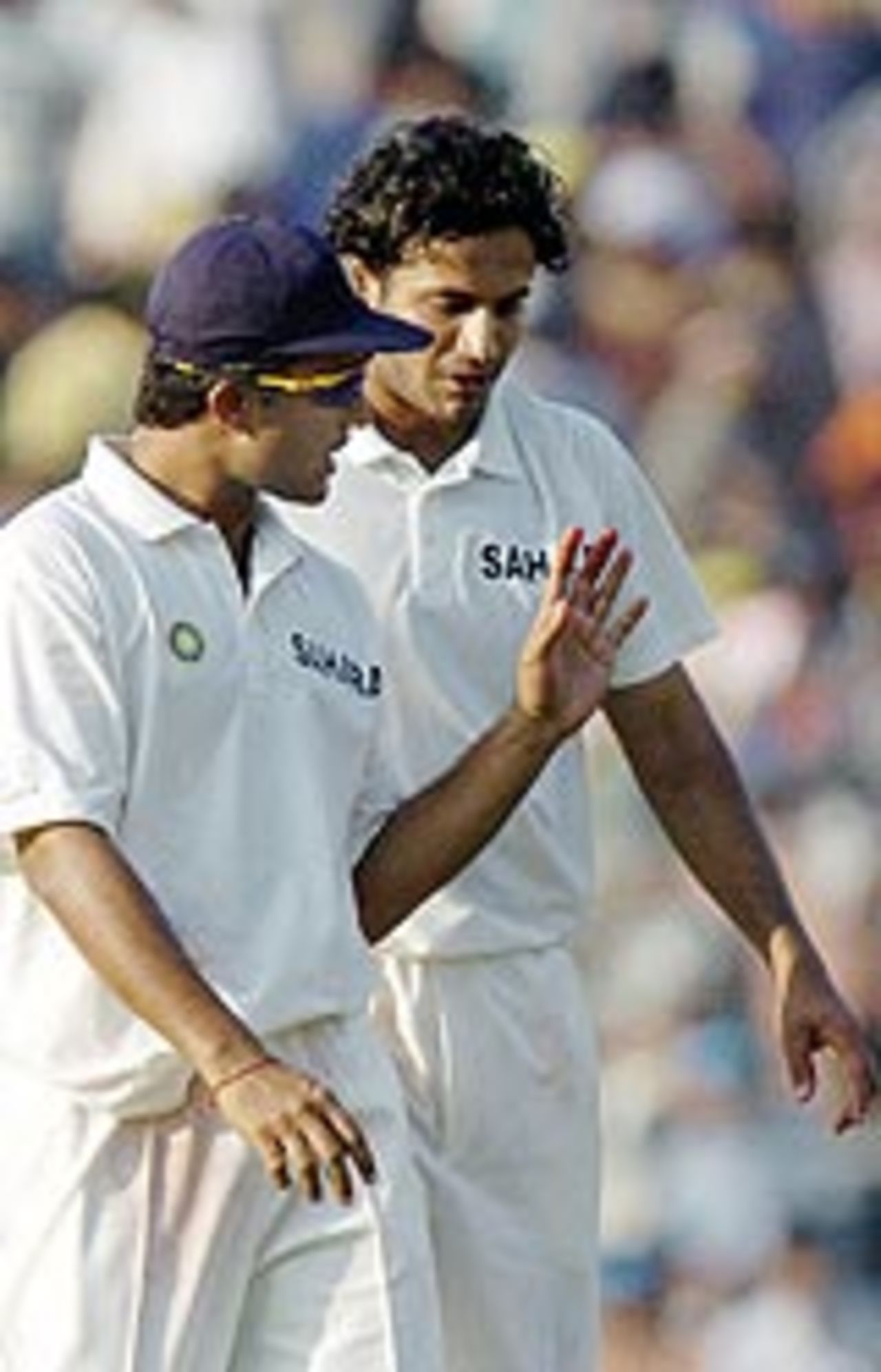 Sourav Ganguly chats with Irfan Pathan, 1st day, 2nd Test, India v South Africa, Kolkata, November 28 2004