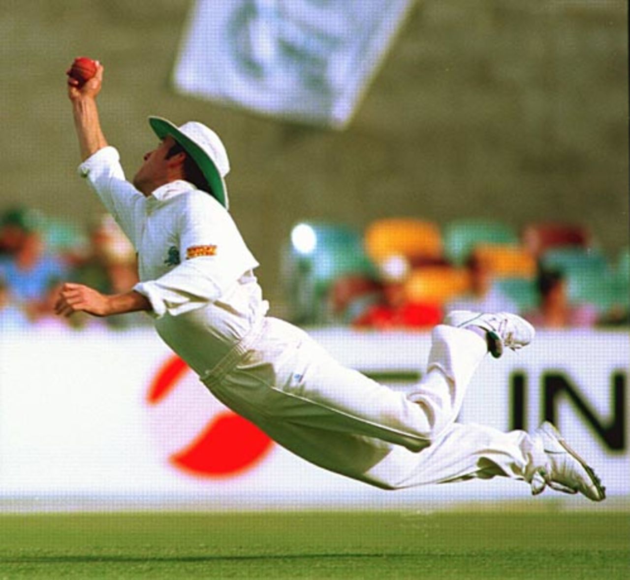 Craig White takes a brilliant diving catch to dismiss Steve Waugh off Phil Tufnell, Australia v England, 1st Test, Brisbane, 1994
