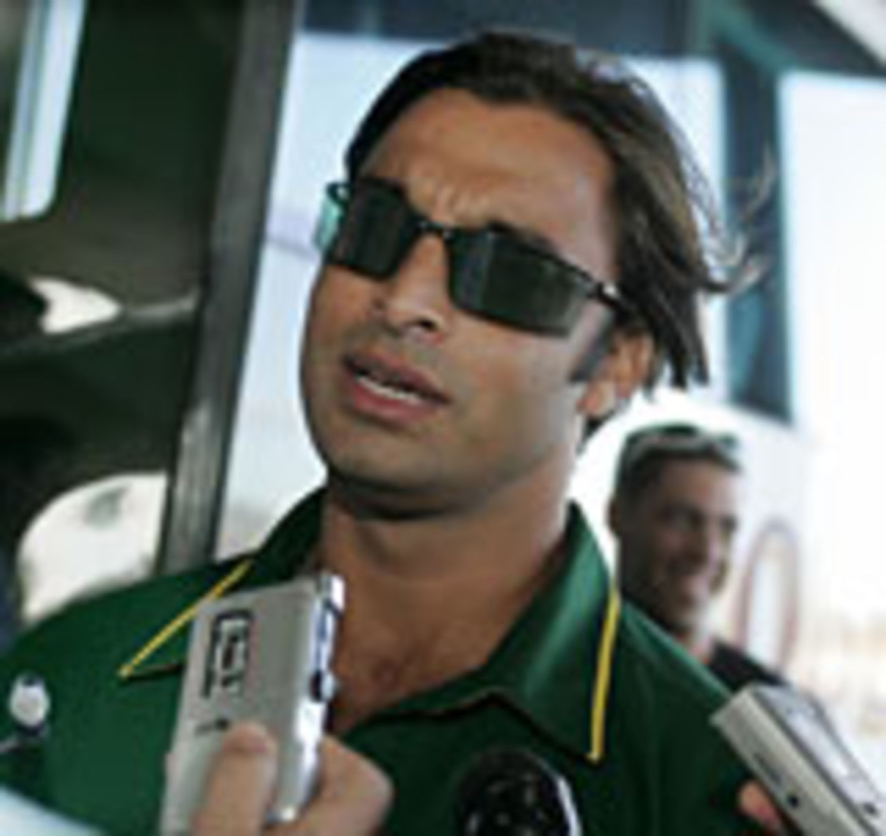 Shoaib Akhtar faces questions upon his arrival in Perth, November 29 2004
