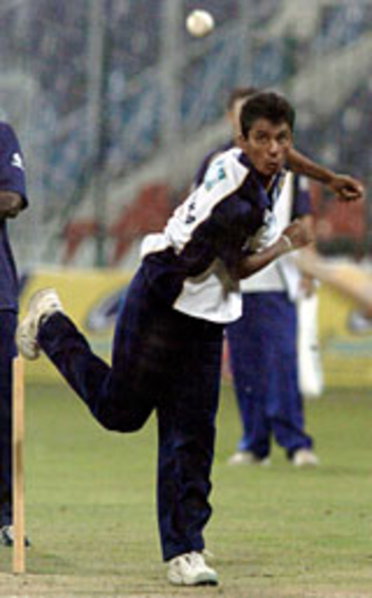 Upul Chandana grooving his action at a practise session, at the Gaddafi stadium in Lahore, October 12 2004