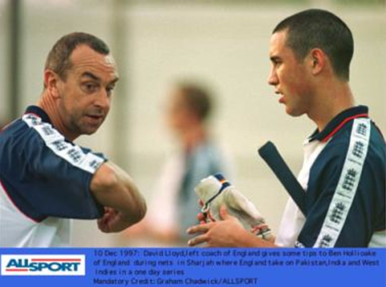 David Lloyd, the England coach, gives tips to Ben Hollioake in the nets at Sharjah - the following day England play their first match in the Champions Trophy taking on India