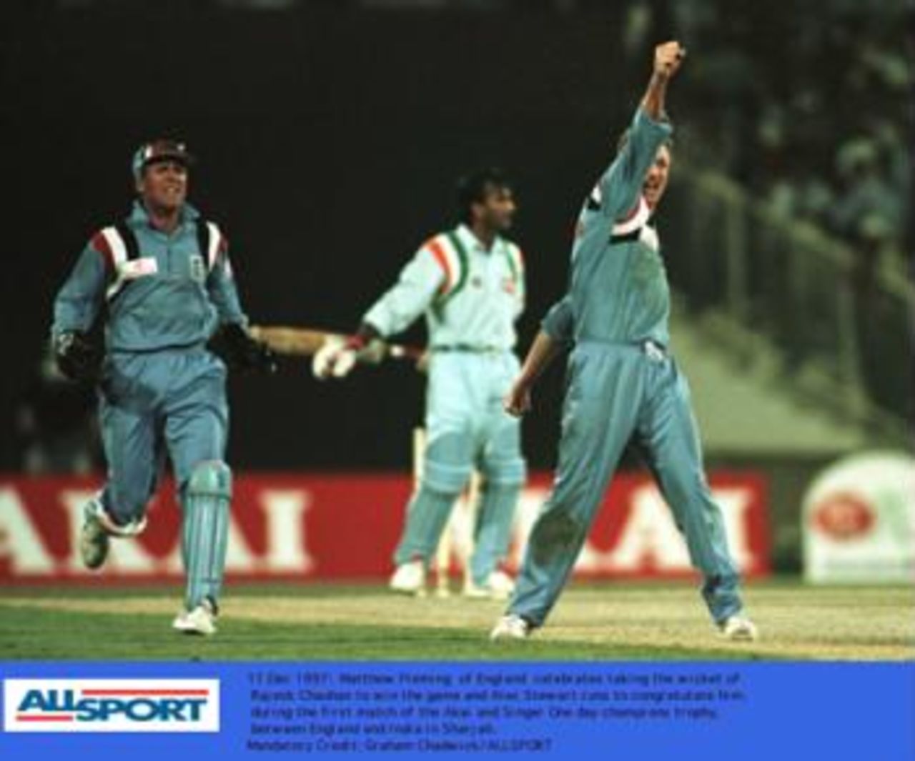 Champion's trophy, December 1997. England v India, 11 Dec 1997: Fleming dismisses Chauhan to end the game as Stewart runs to congratulate him