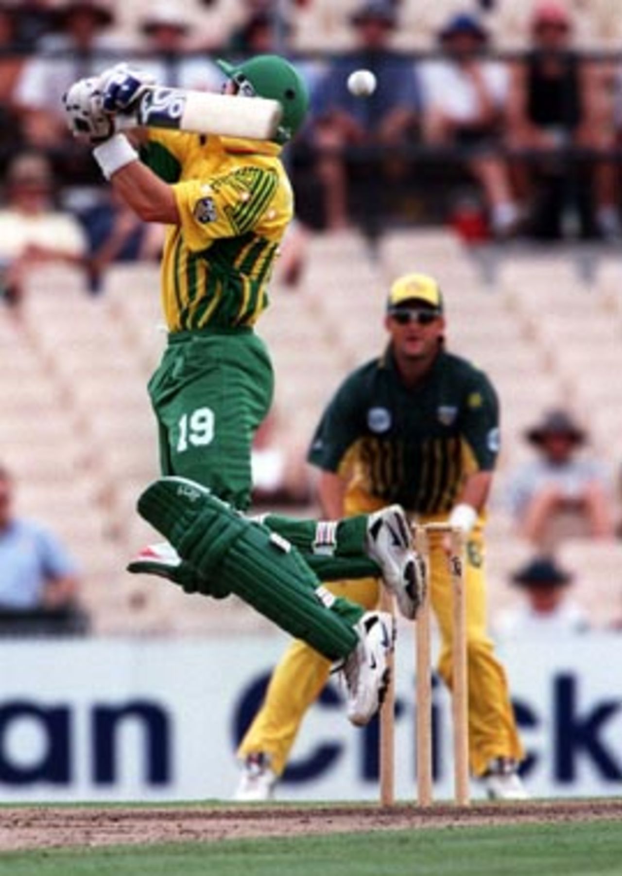 Ryan Campbell gets up high and chases a ball . ...Australia v Australia 'A', Sydney Cricket Ground, Sunday December 14th 1997.