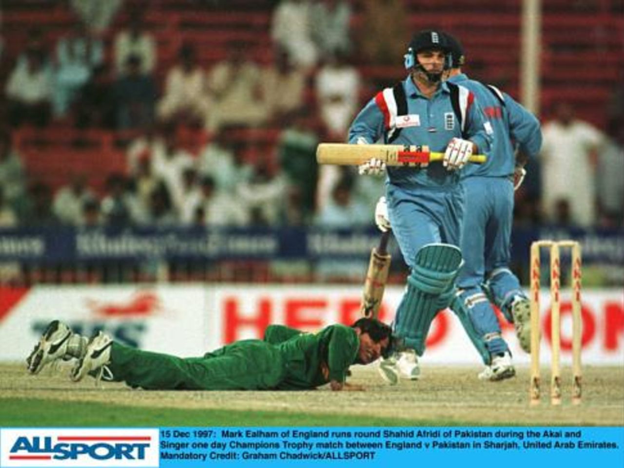 Champions Trophy Sharjah 1997, England v Pakistan 15 Dec. Ealham avoids Shahid Afridi as he takes a single