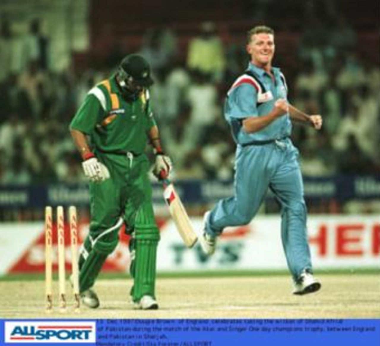 Dougie Brown of England celebrates taking the wicket of Shahid Afridi in the match between England and Pakistan in the Champions Trophy in Sharjah