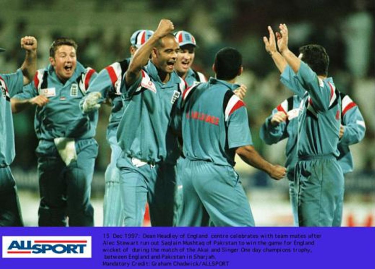 Champions Trophy December 1997, England v Pakistan, Dean Headley and Adam Hollioake lead England's celebration after Alec Stewart runs Saqlain Mushtaq out to win the match for England.