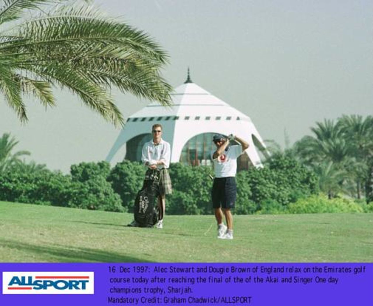 Champion's Trophy, Dec 1997 England's Dougie Brown and Alec Stewart relax on the golf course as they await the result of the India-West Indies game
