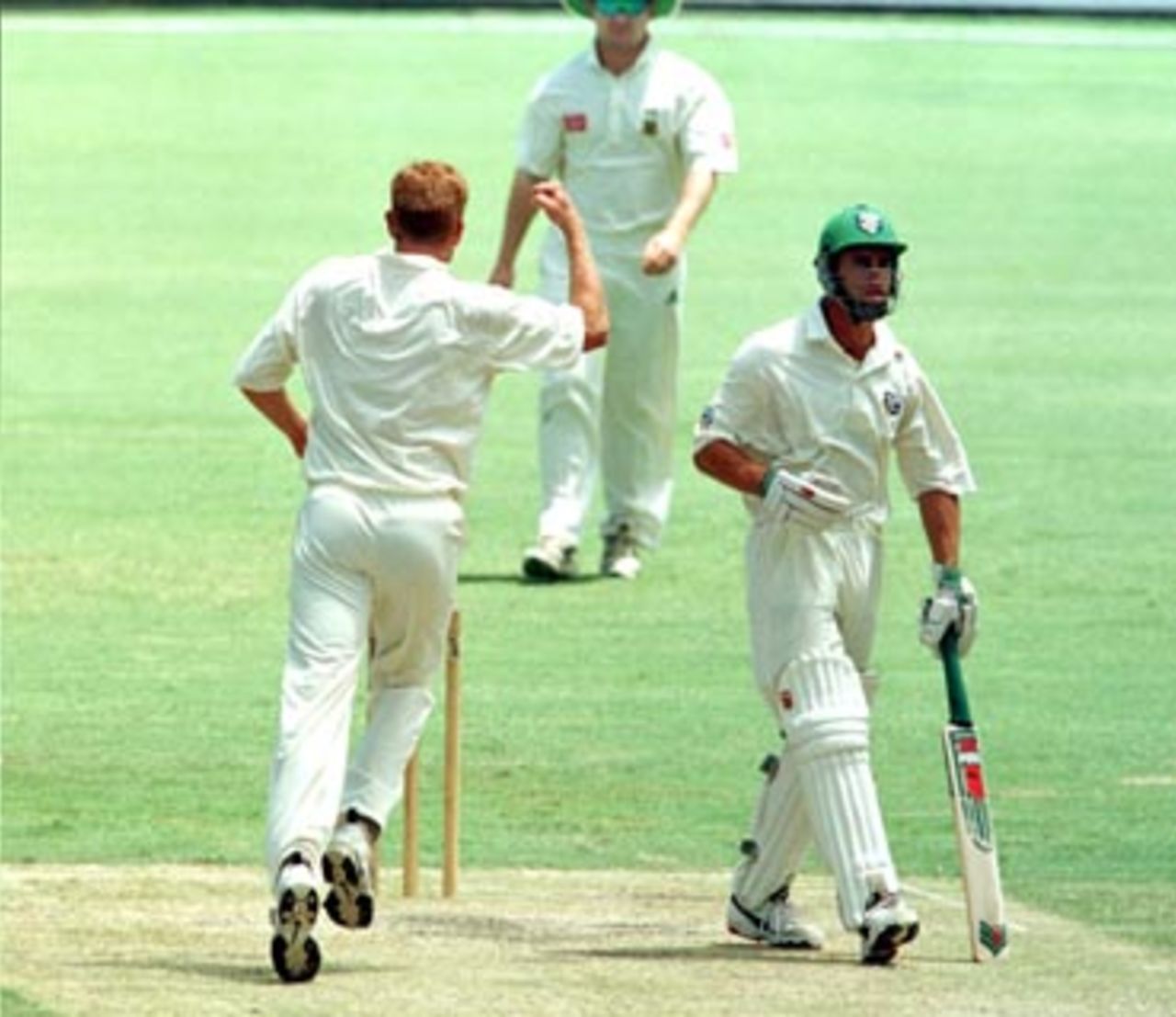 Michael Bevan walks back to the rooms after being caught behind from a Sean Pollock ball during the 3rd day of the Australia 'A' v South Africans 4 day match at the Gabba in Brisbane. December 21st 1997.