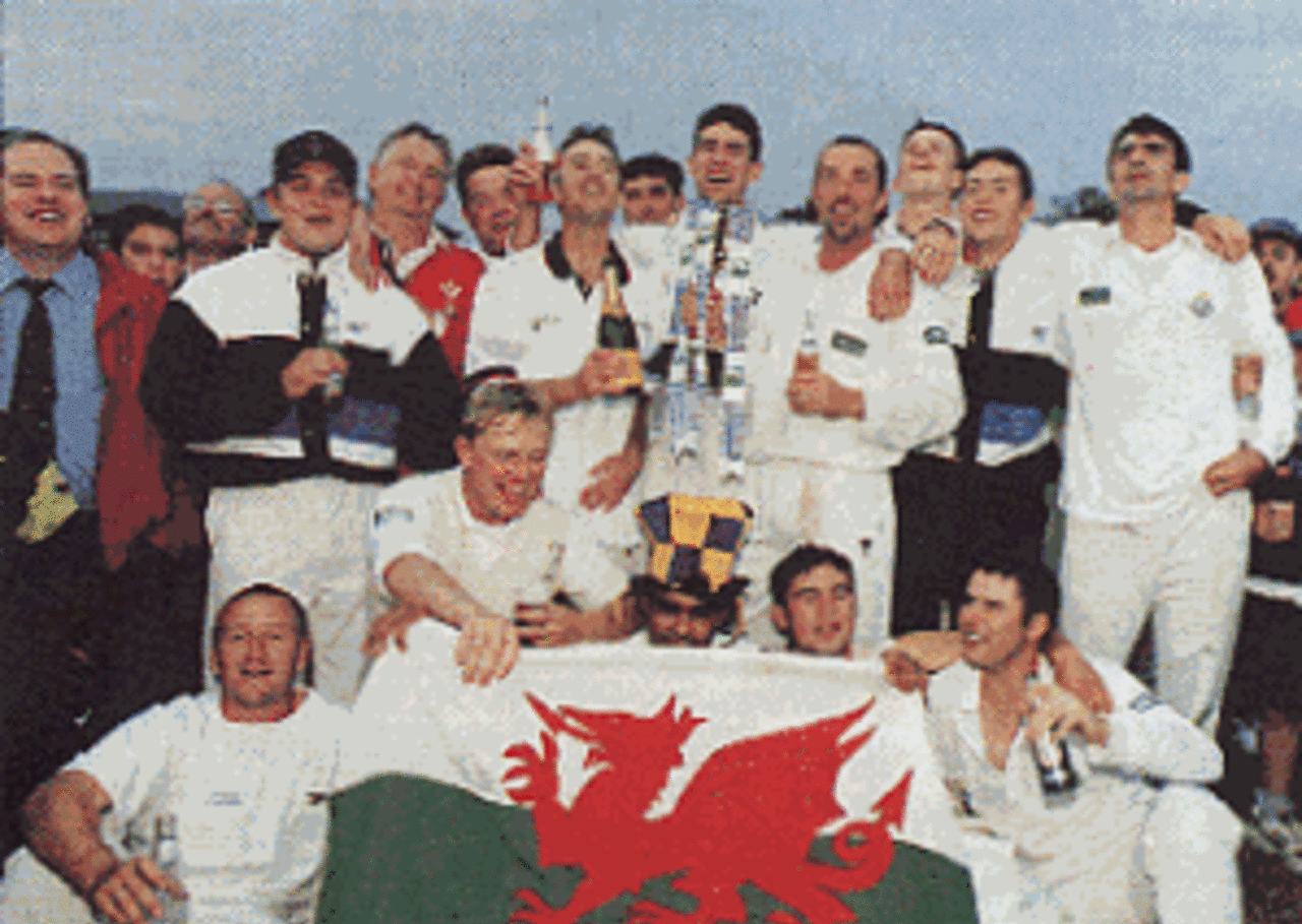 The team celebrate at Taunton after their Championship triumph