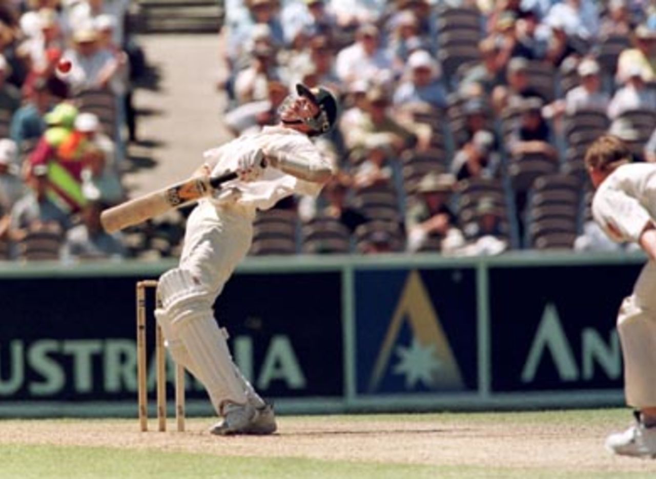 Glenn McGrath gets bounced by Lance Klusener during the 4th day of the Australia v South Africa Test match at the MCG in Melbourne. December 29th 1997.