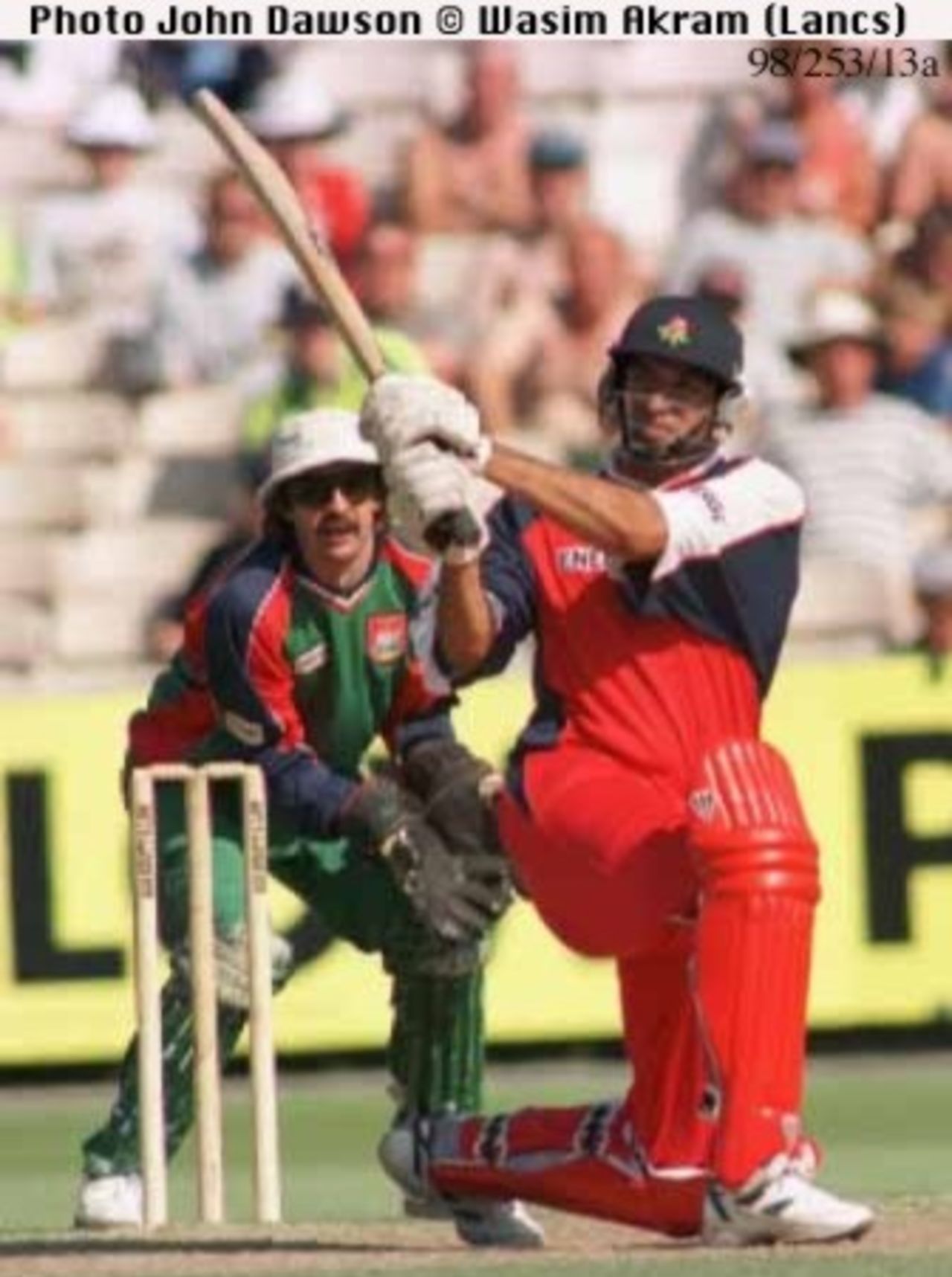 Wasim Akram pulls the ball
