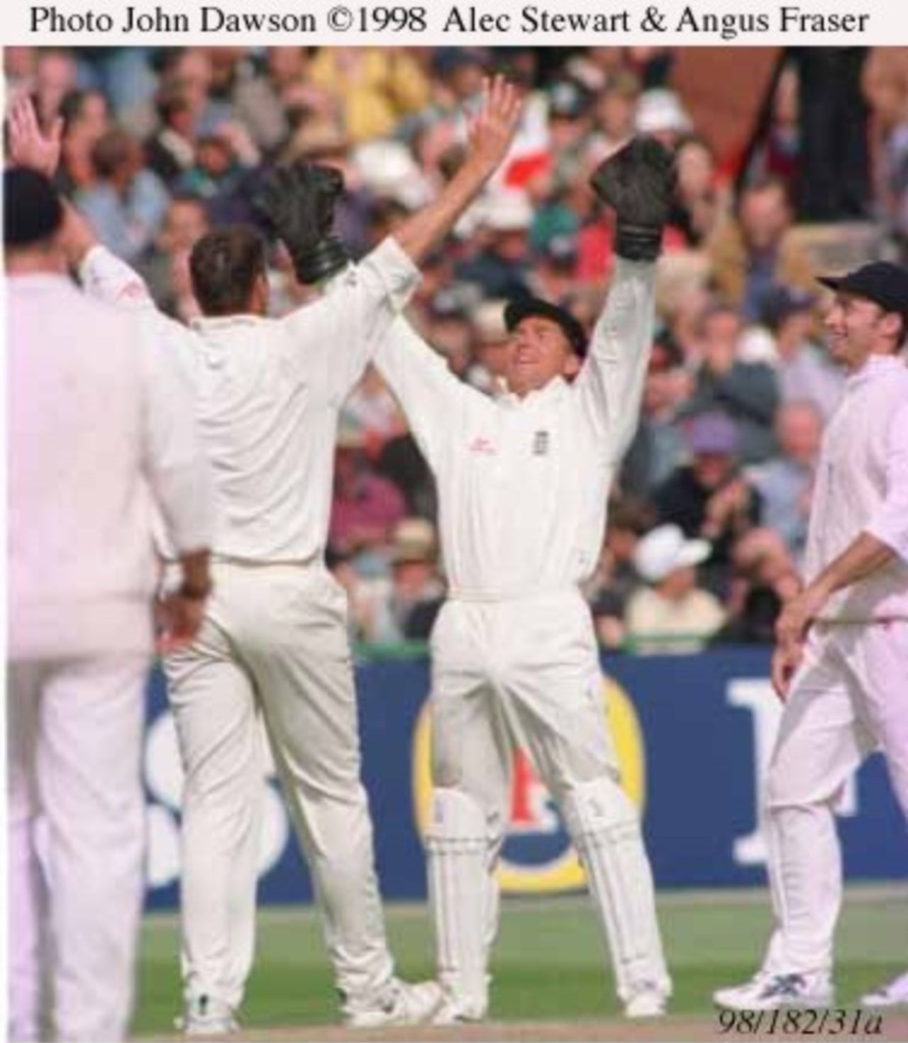Alec Stewart and Angus Fraser celebrate another wicket