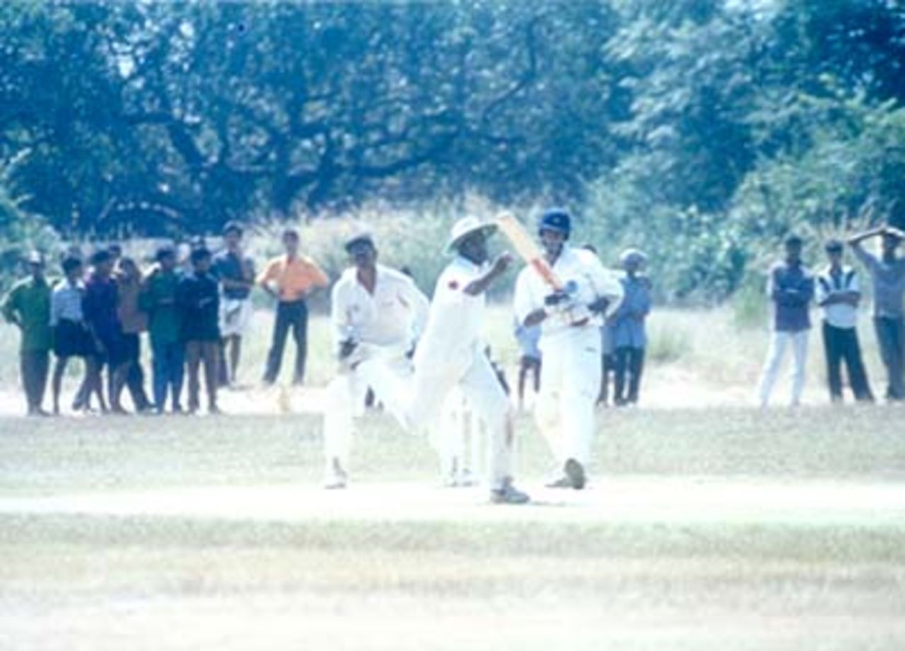 MP Sorab gets one past a lunging Daniel Manohar at silly point, Kerala v Hyderabad, Ranji Trophy (South Zone League) 1999/00, 24-27 November 1999 at Regional Engineering College Ground, Kozhikode