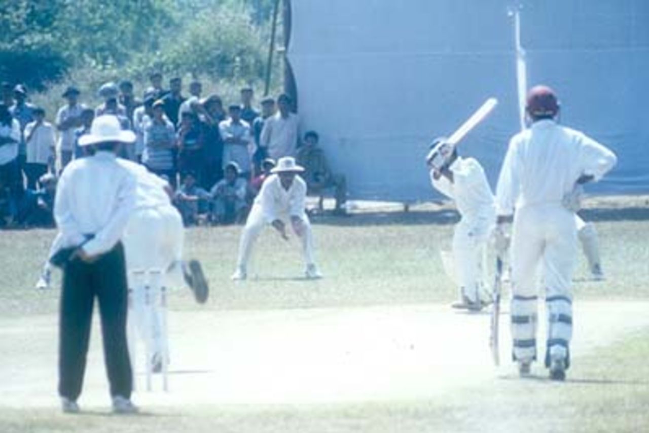 Satyaseelan Sasikanth steps onto the backfoot to square-drive NP Singh, Kerala v Hyderabad, Ranji Trophy (South Zone League) 1999/00, 24-27 November 1999 at Regional Engineering College Ground, Kozhikode.
