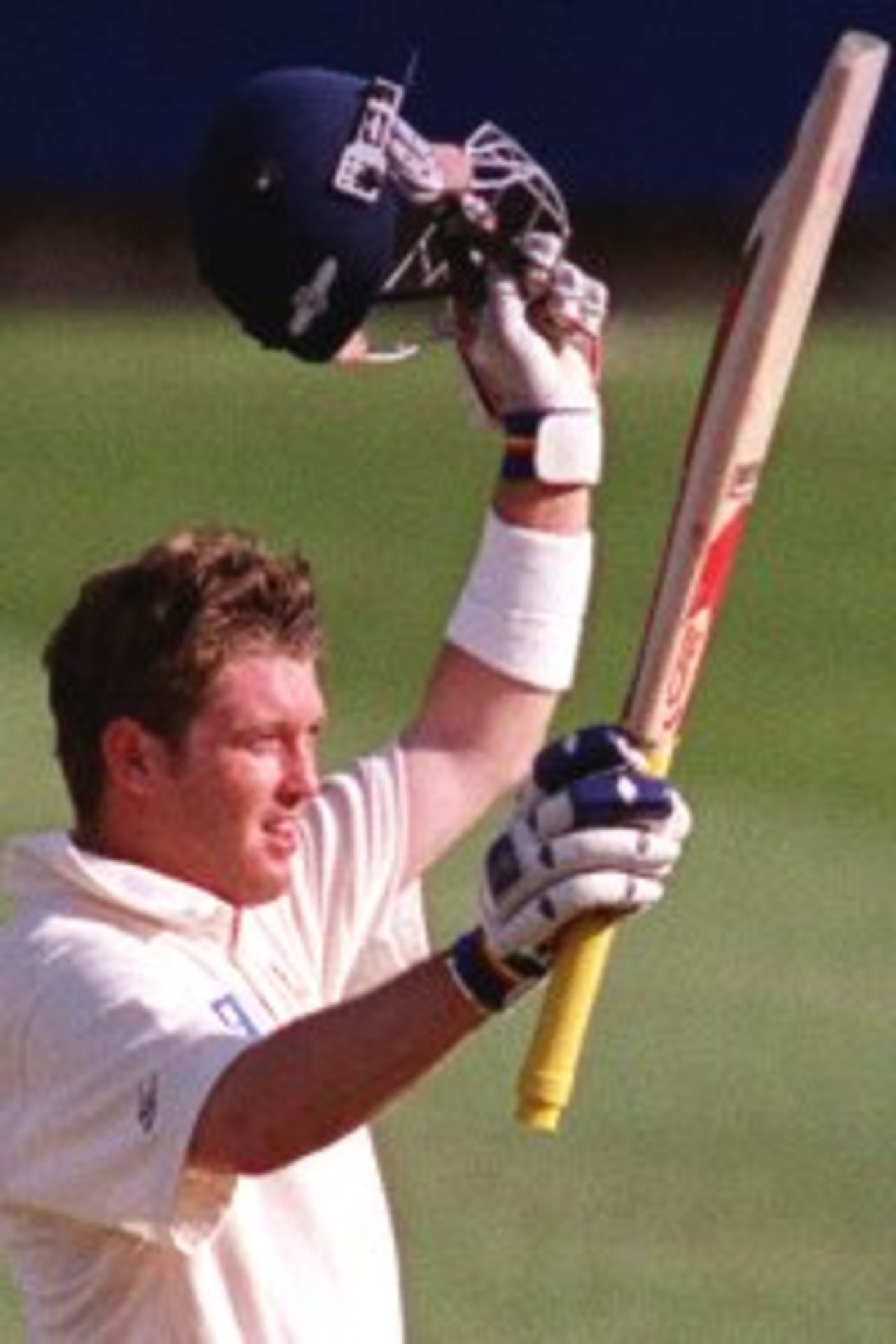 1 Dec 1999: Ian Harvey of Victoria celebrates his century on day one of the Pura Milk Cup match between Victoria and Western Australia, played at the Melbourne Cricket Ground, Melbourne, Australia