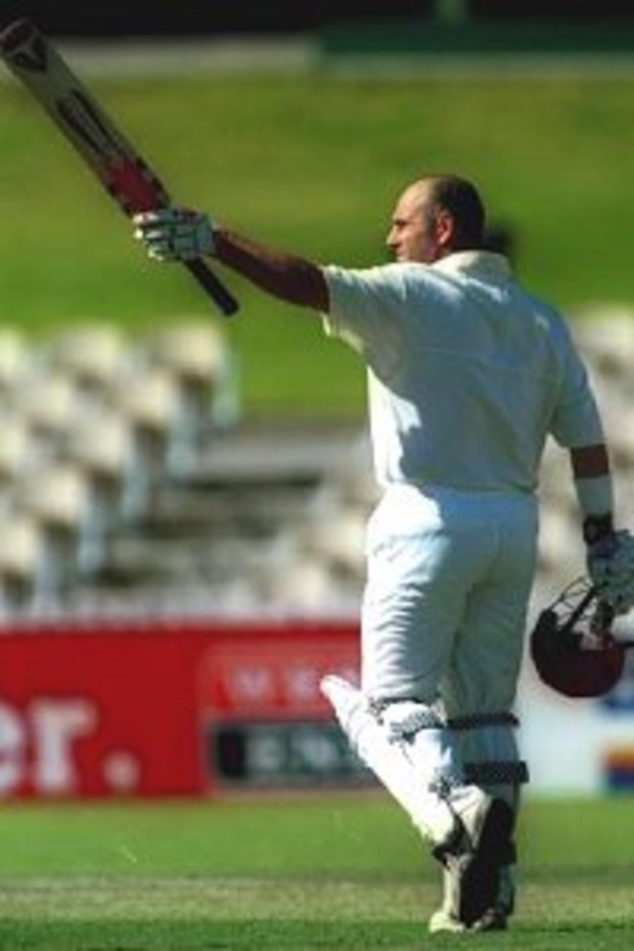 18 Nov 1999: Darren Lehmann the South Australian Captain waves his bat to his teamates after reaching his 100 during day one of the Pura Milk Cup Match played between South Australia and Western Australia at the Adelaide Oval. Lehmann was top score for South Australia and was out for 120