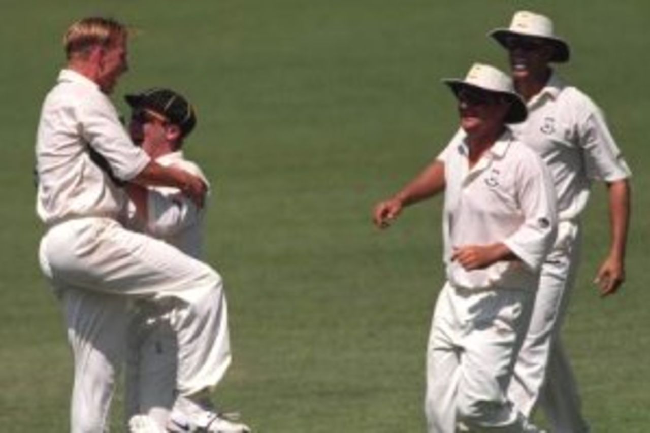 7 Dec 1999: Brett Lee celebrates the wicket of Sachin Tendulkar of Indian captain out for two runs in the match at Manuka Oval.