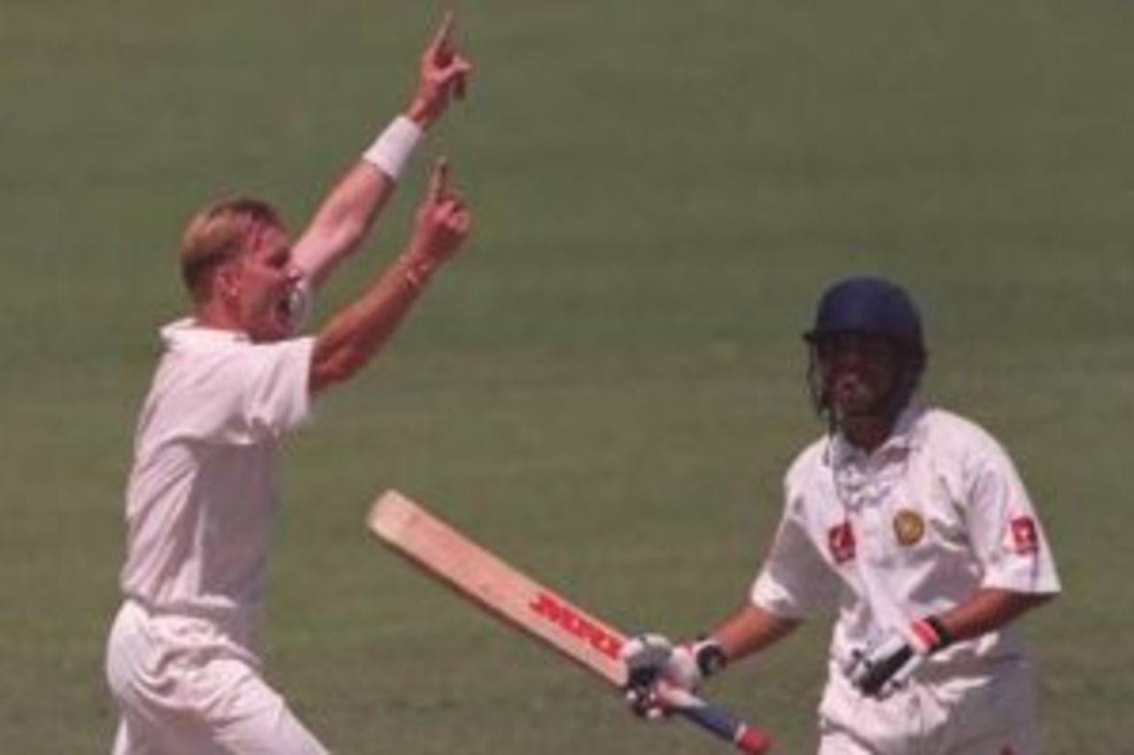 7 Dec 1999: Brett Lee bowler for the Prime Ministers XI celebrates the wicket of Sachin Tendulkar, Indian captain out for two runs in the match between the Prime Ministers XI and India played at Manuka Oval Canberra, Australia.