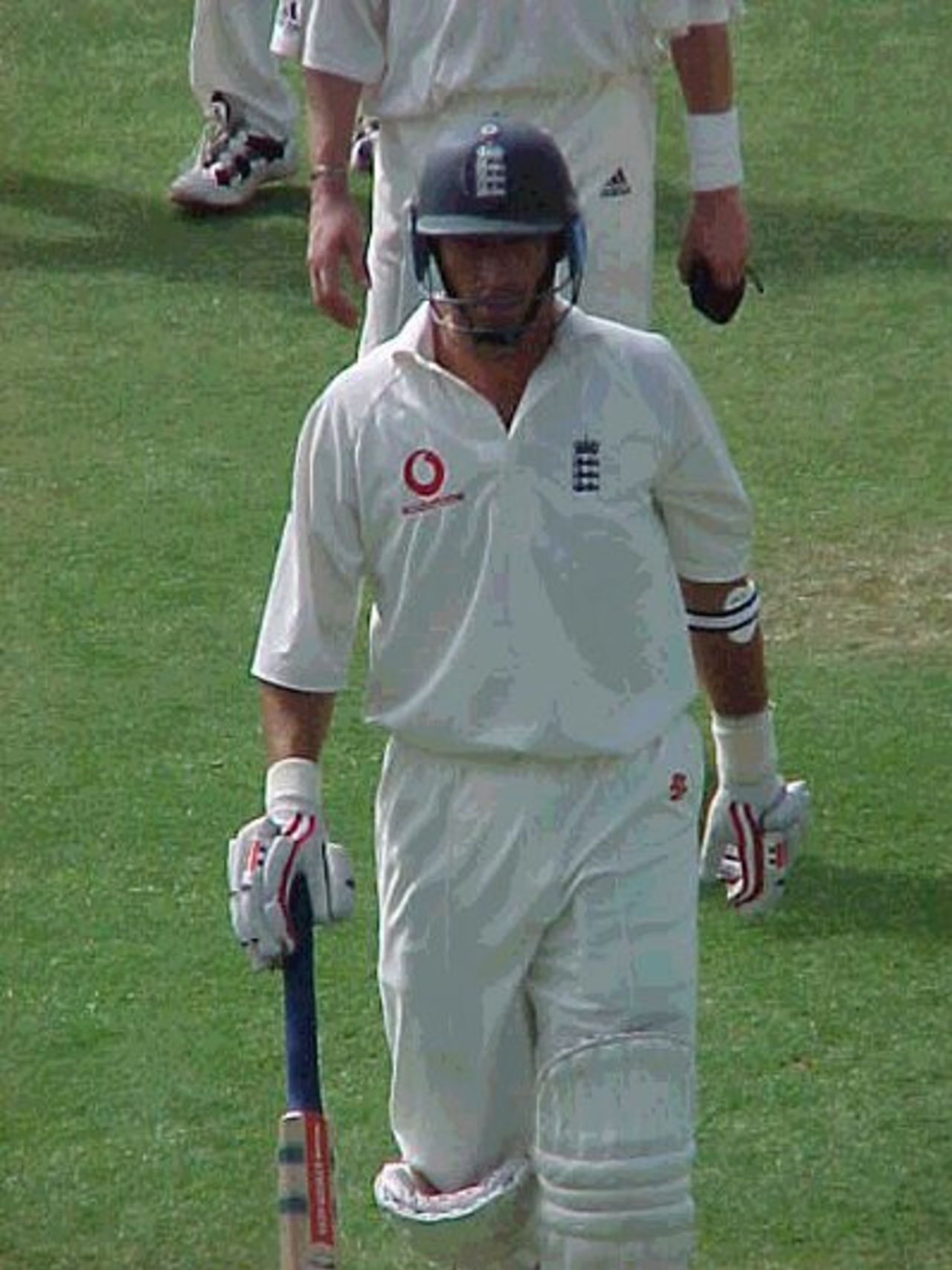 England captain Nasser Hussain makes his way off the outfield towards the pavillion having survived until tea on the second day of the second Test match in Port Elizabeth.