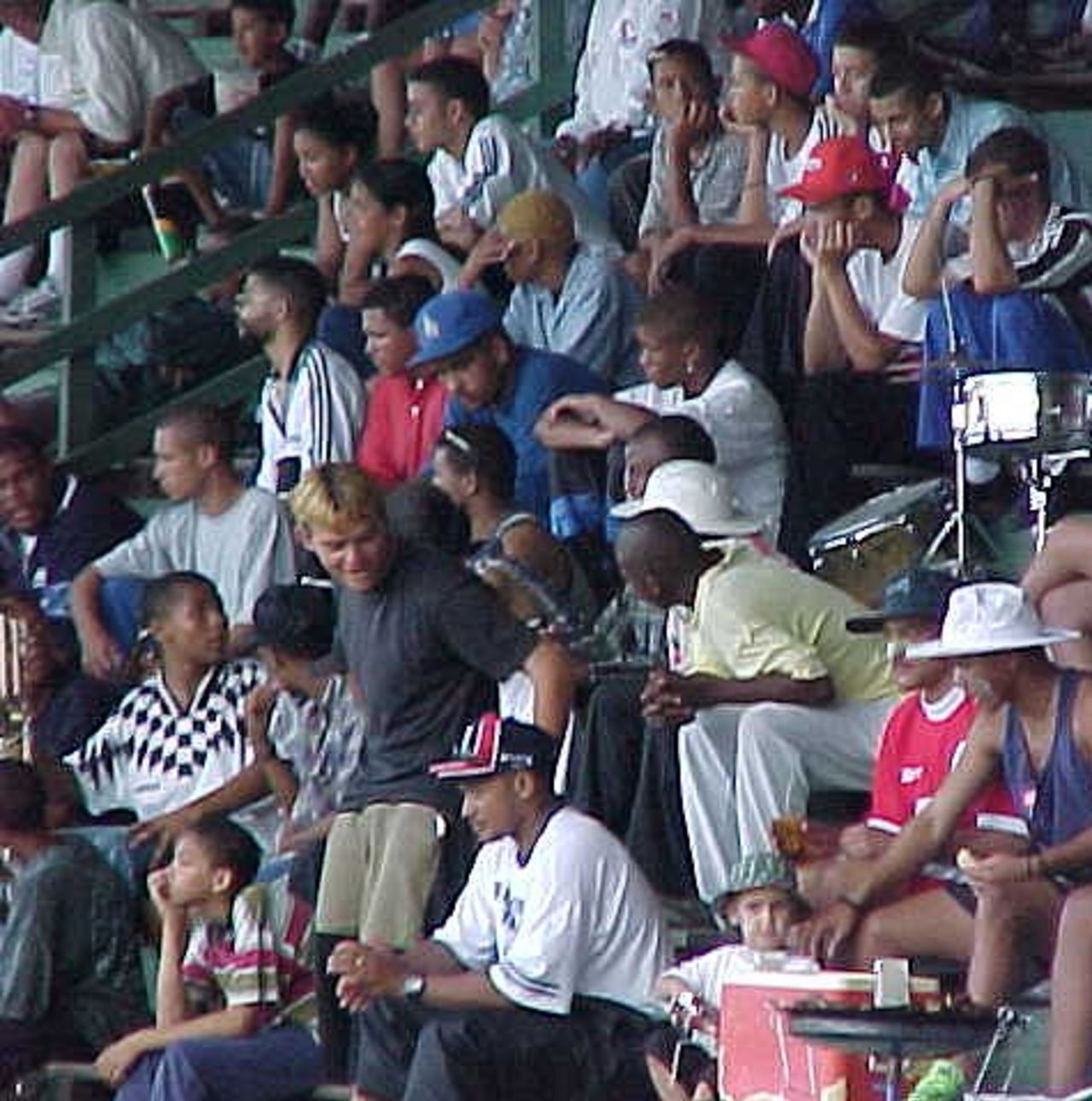 Local residents from Port Elizabeth follow play on the second afternoon of the Second Test between England and South Africa. (10 December 1999)