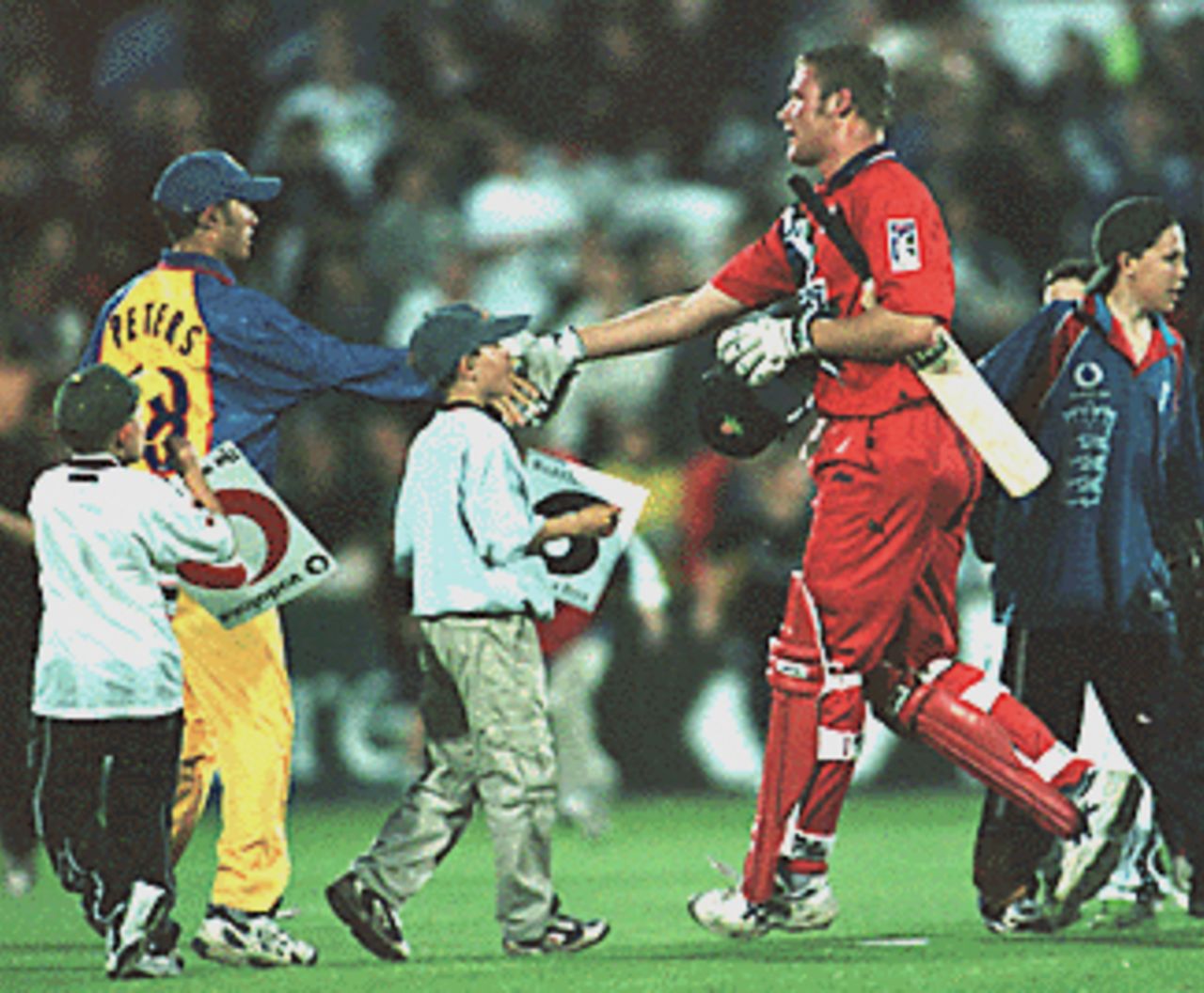 Andrew Flintoff hand shaking with Essex player after winning the match, Essex v Lancashire, National League 1st Division, 3 July 1999