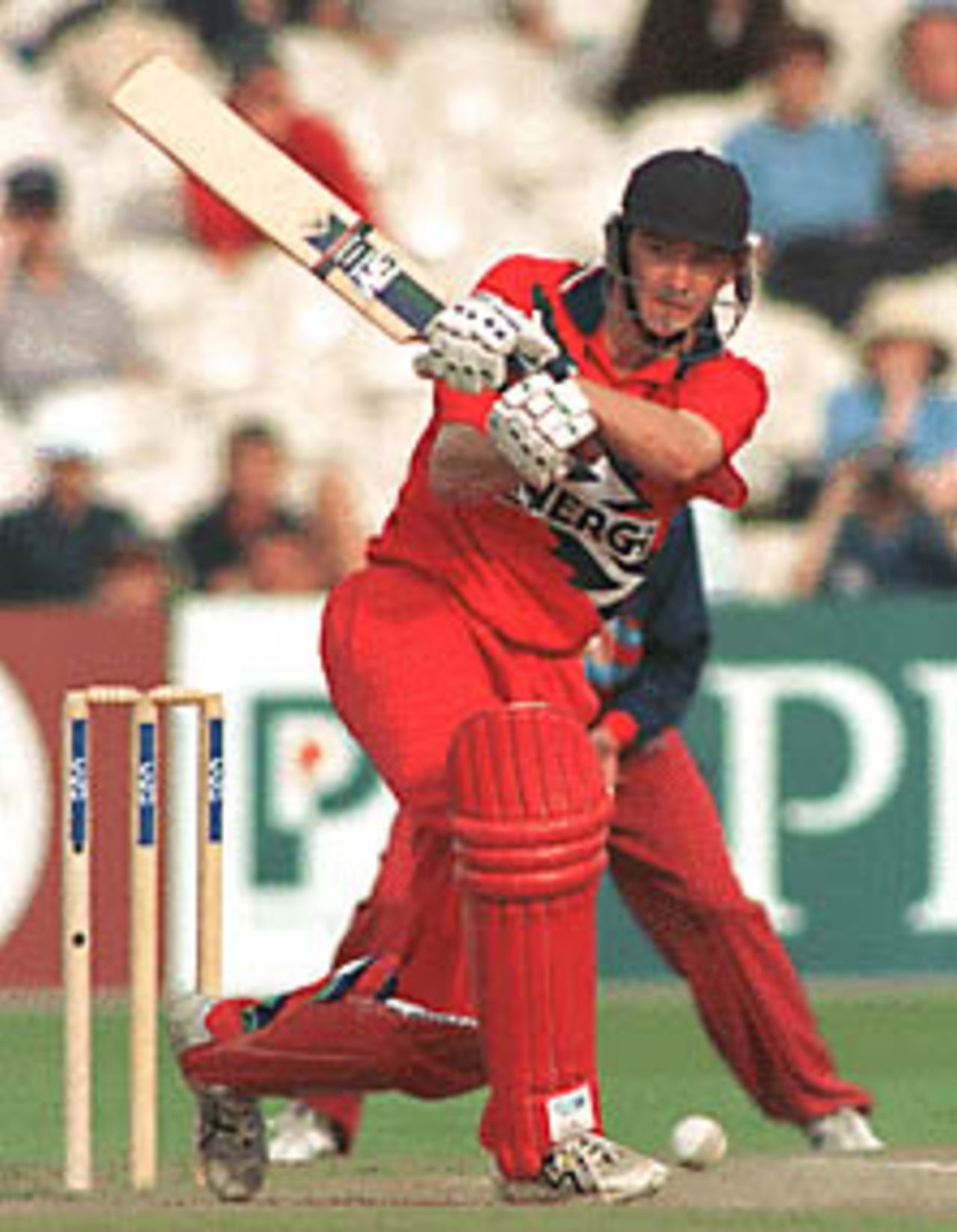 Chris Schofield in bowling action, Lancashire v Kent, National League 1st Division, 12 September 1999