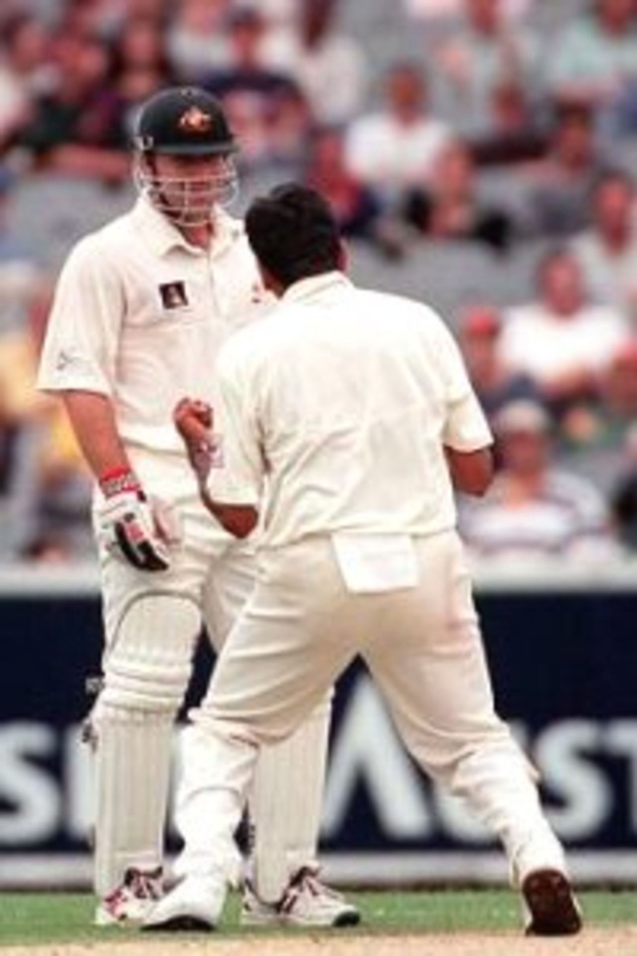27 Dec 1999: Michael Slater of Australia looks on as Venkatesh Prasad of India celebrates taking his wicket, on day two of the second test match between Australia and India, played at the Melbourne Cricket Ground, Melbourne, Australia. Slater was out for 91 runs.