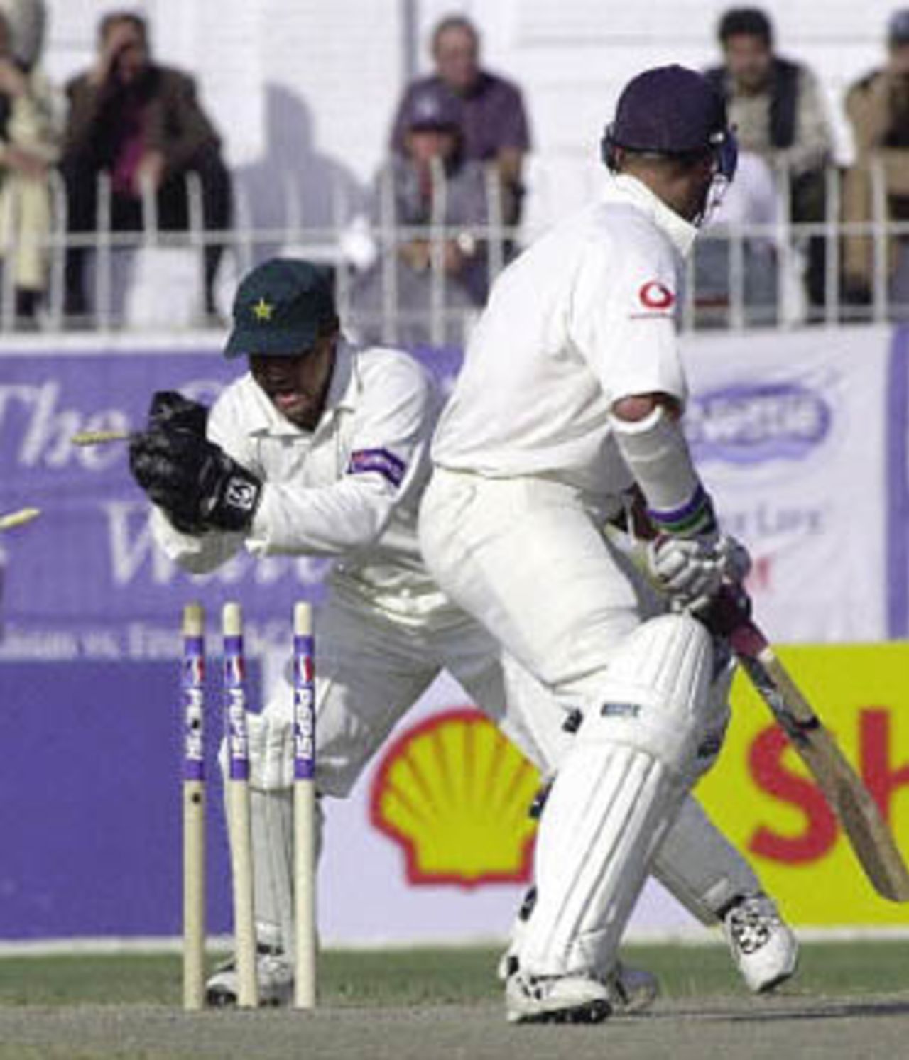 Marcus Trescothick looks back to see Moin stump him off rookie Danish Kaneria, England in Pakistan, 2000/01, 2nd Test, Pakistan v England, Iqbal Stadium, Faisalabad, 29Nov-03Dec 2000 (Day 2).