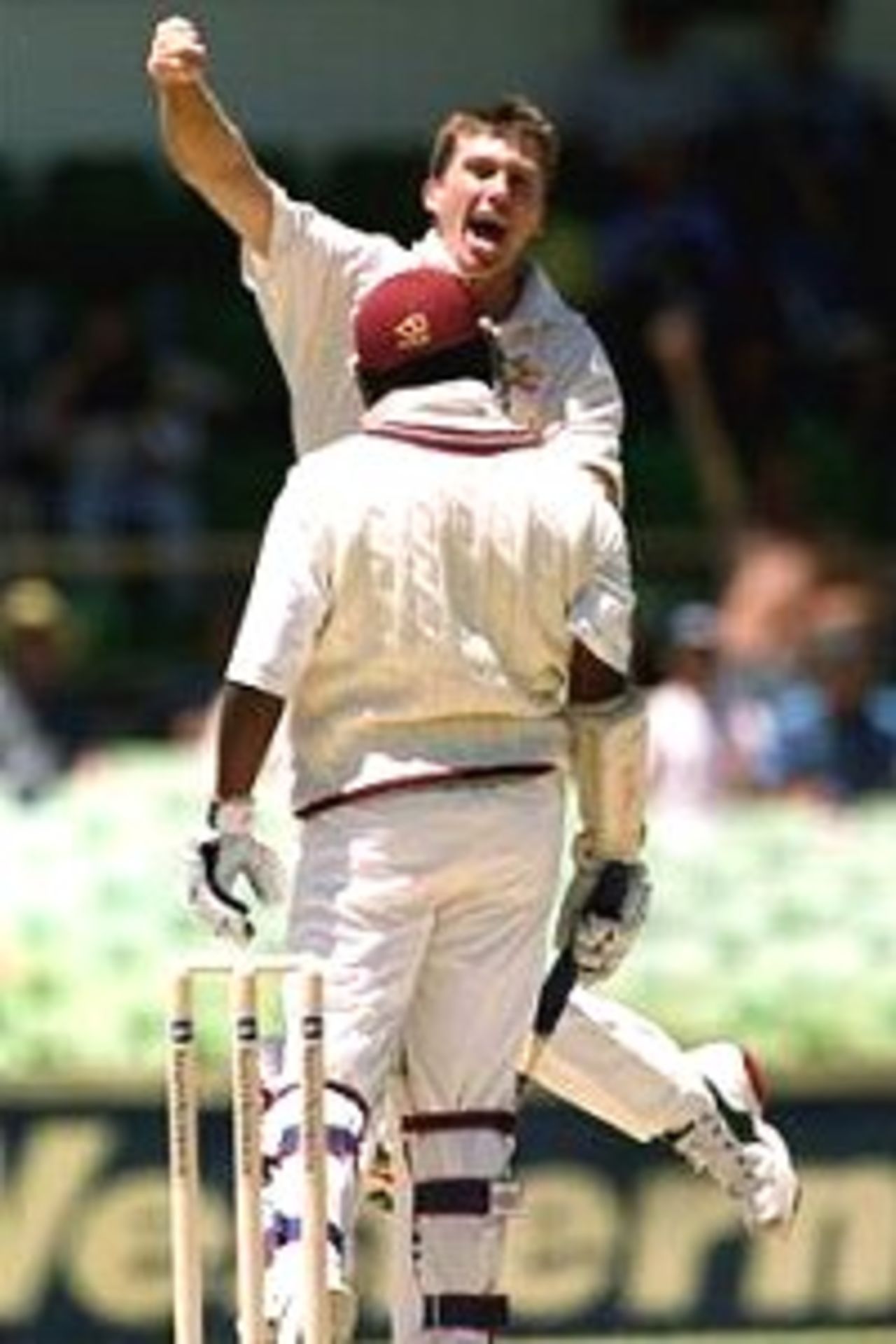 1 Dec 2000: Glenn McGrath of Australia claims his 300th Test wicket by having Brian Lara of the West Indies caught by Stuart MacGill first ball for nought as part of a hat trick during the first days play of the Second Test match between Australia and West Indies at the WACA Cricket Ground, Perth, Australia.