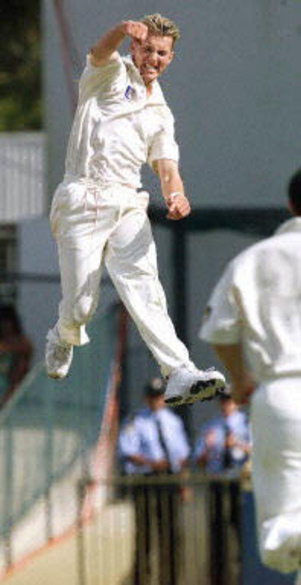Brett Lee leaps high into the air after getting rid of Nixon McLean, The Frank Worrell Trophy, 2000/01, 2nd Test, Australia v West Indies, W.A.C.A. Ground, Perth, 01-05 December 2000 (Day 3).
