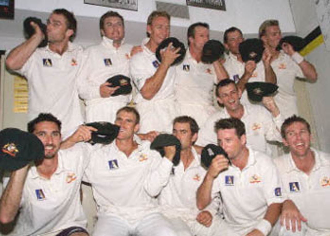 The Aussies kiss their baggy green caps after winning a record 12 consecutive matches, The Frank Worrell Trophy, 2000/01, 2nd Test, Australia v West Indies, W.A.C.A. Ground, Perth, 01-05 December 2000 (Day 3).