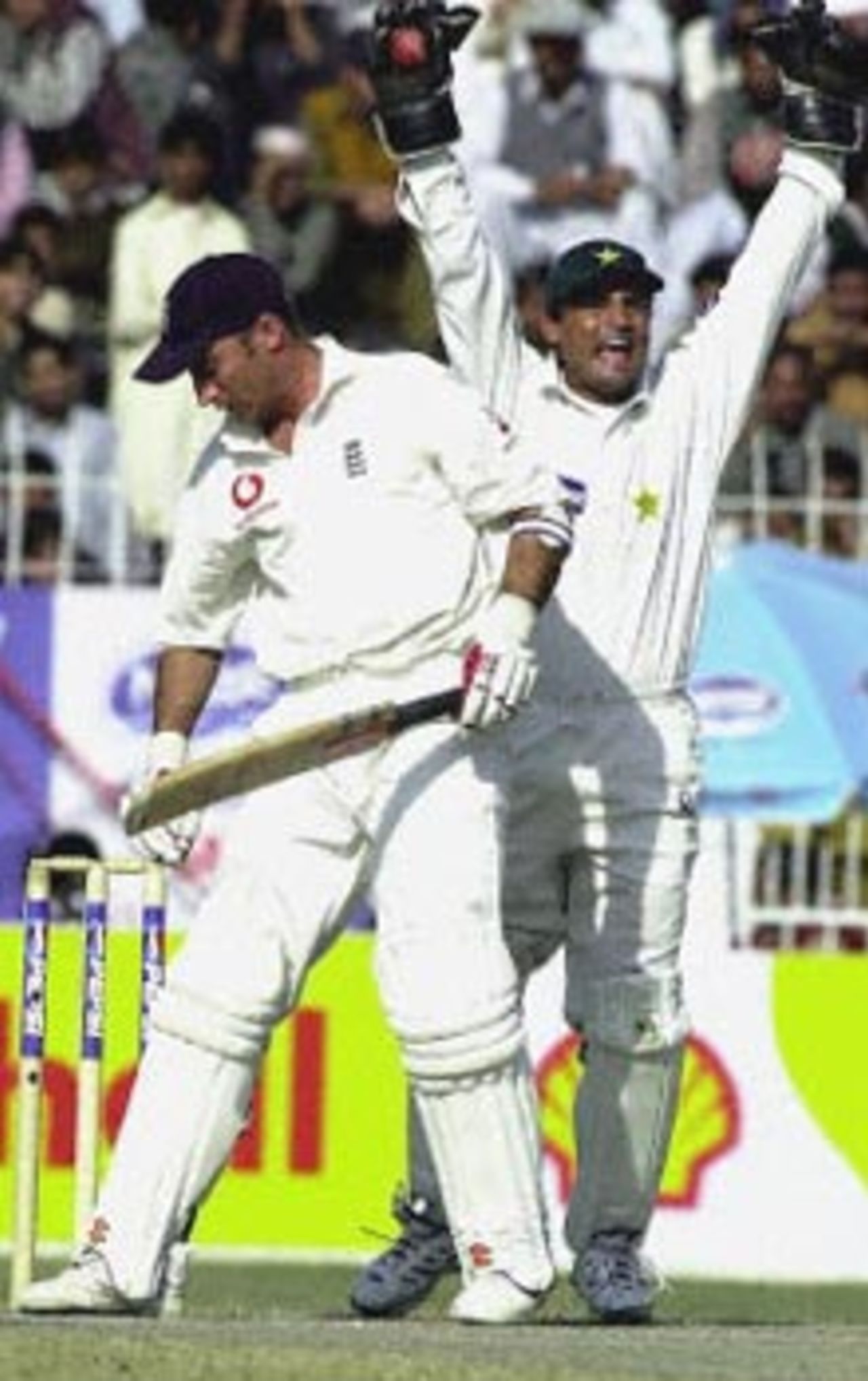 Nasser Hussain can't bear to look as Moin Khan successfully appeals for his dismissal, England in Pakistan, 2000/01, 2nd Test, Pakistan v England, Iqbal Stadium, Faisalabad, 29Nov-03Dec 2000 (Day 5).